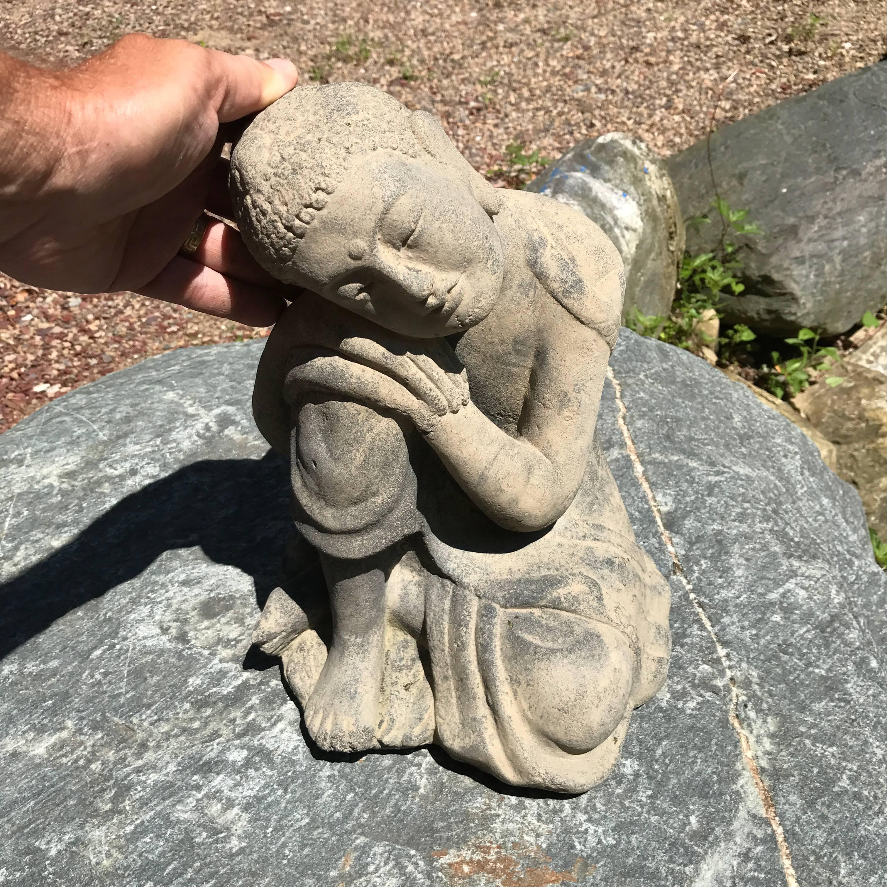Here's an attractive stone Restive and Serene Buddha that might grace your favorite garden spot, pool, or indoor sanctuary or shrine space. 

This was sourced from an American garden collection this past year. 

Quality: Fine smoothly carved head,