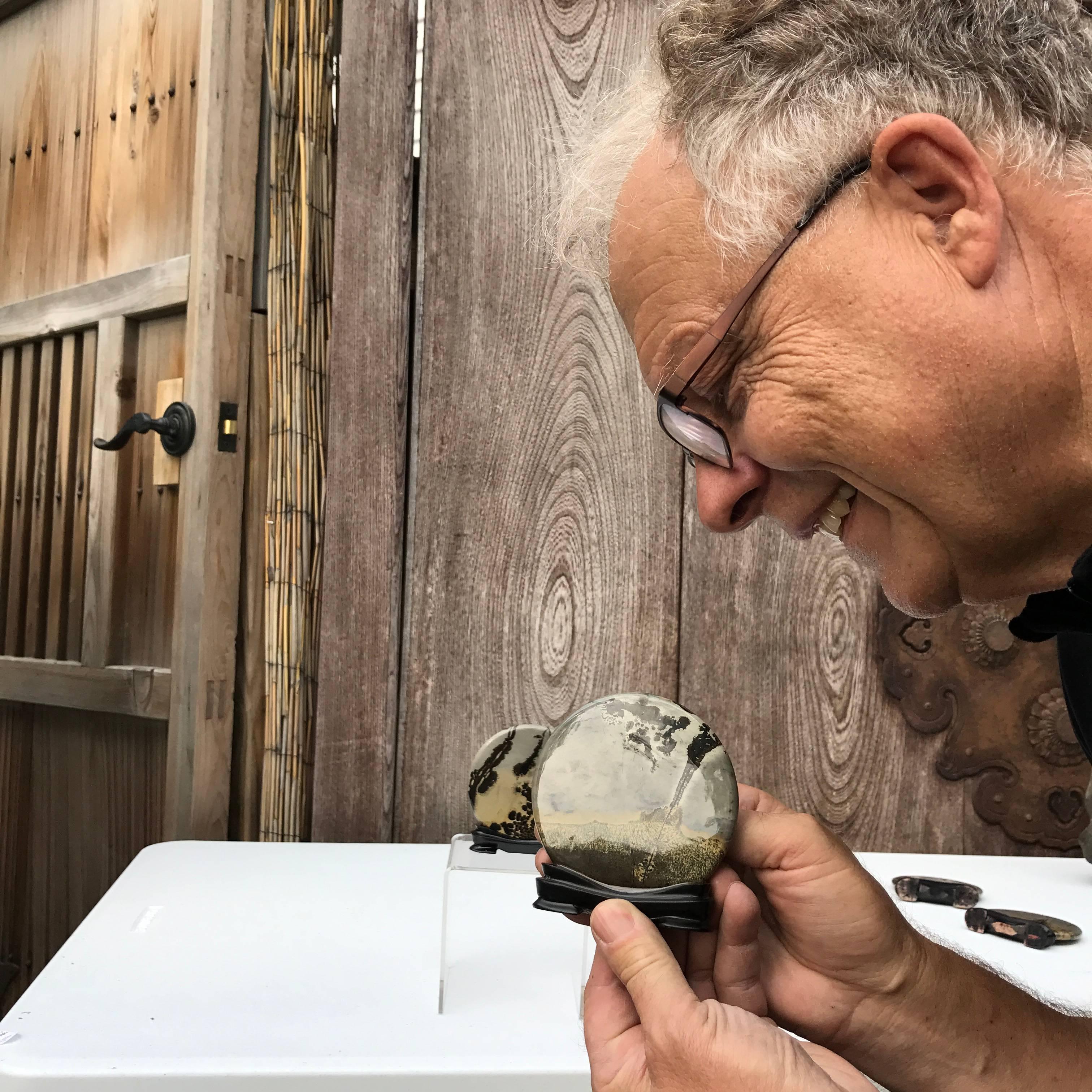 This pair of Chinese extraordinary natural round viewing stones from China are completely natural stones that simply take your breathe away! 

Found in Southern China, they are also known as a painting stones Guo Hua as the Chinese believe these are