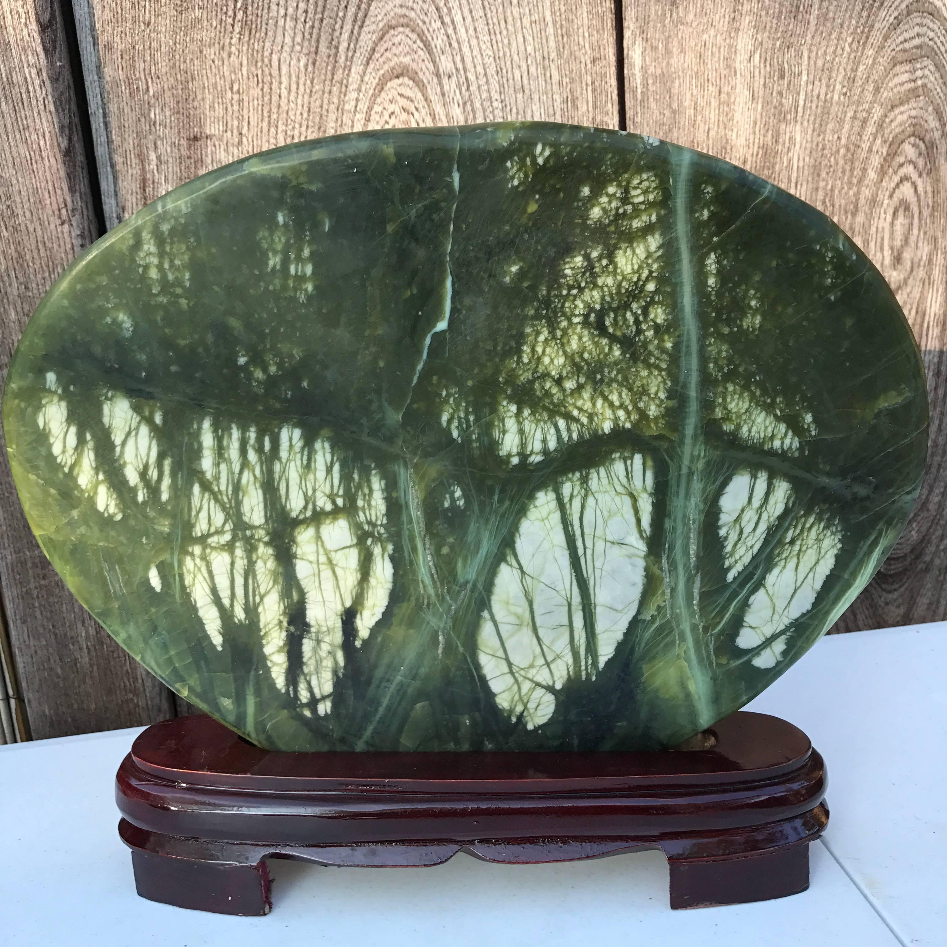 This extraordinary natural viewing stone from China in the form of green trees is a completely unique and natural stone that simply takes your breath away. 

Sometimes known as jadestone or bamboo stone, raw rocks or boulders are found in Eastern