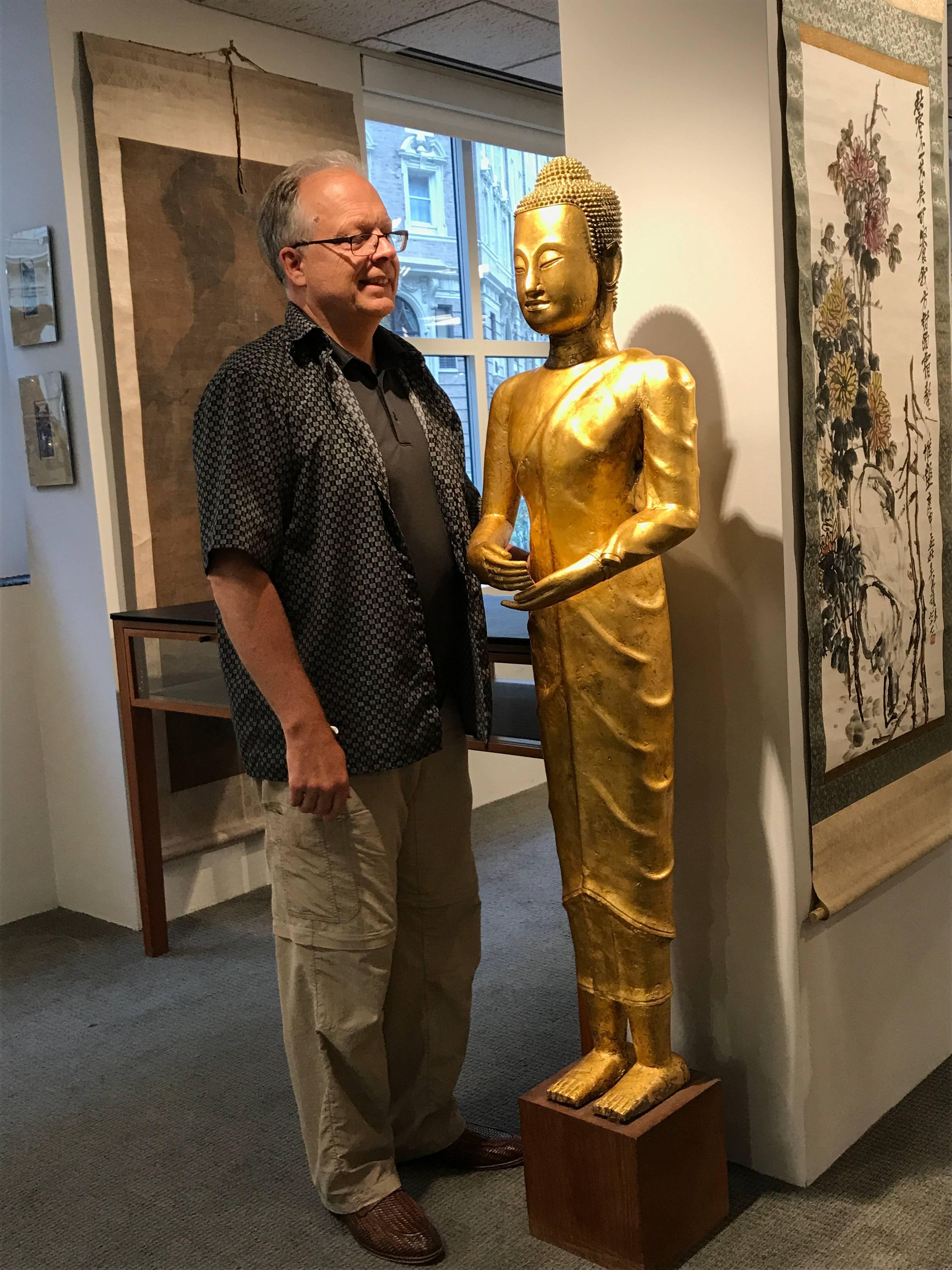 Thailand, Ayutthaya Kingdom, 16th-17th century gold gilt bronze temple Buddha, measuring 60 inches tall

This beautiful Buddha sculpture will bring serenity and timeless style to your home, office, or sacred space.

The long aquiline nosed holy