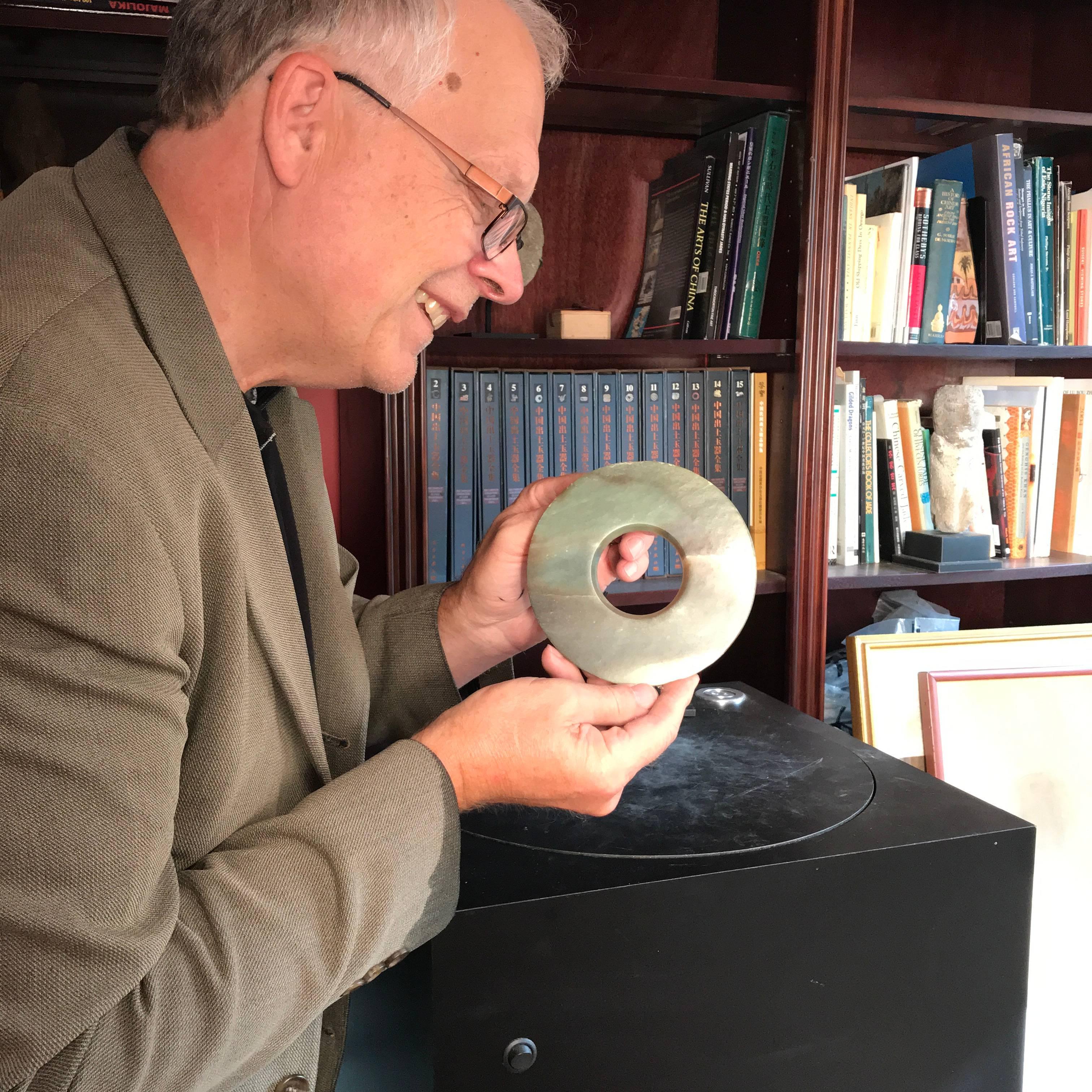 This is an authentic Chinese ancient jade bi disc from the Qi Jia Culture, Northwestern China, 3,000-2,000 BCE. This comes from our private collection. 

Including Our Certificate of Authenticity

Dimensions: the bi disc is 5.45 inches diameter and