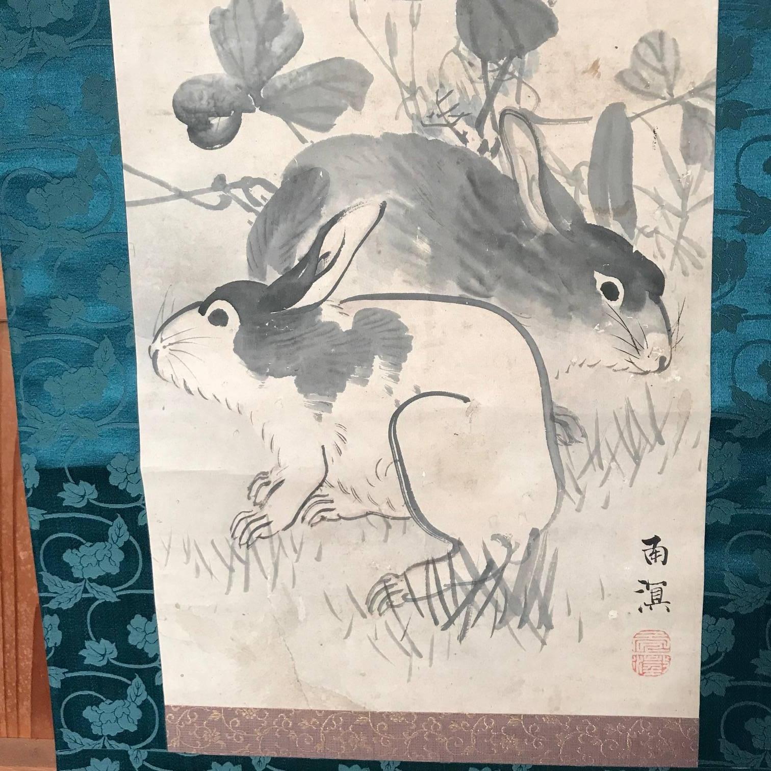 Japan, an attractive old hand painting on paper scroll of a pair of playful rabbits, signed, Showa period, (1926-1940).

Dimensions: Scroll 15 inches wide and 71 inches length.

Hard to find subject matter, this handsome painting is skillfully