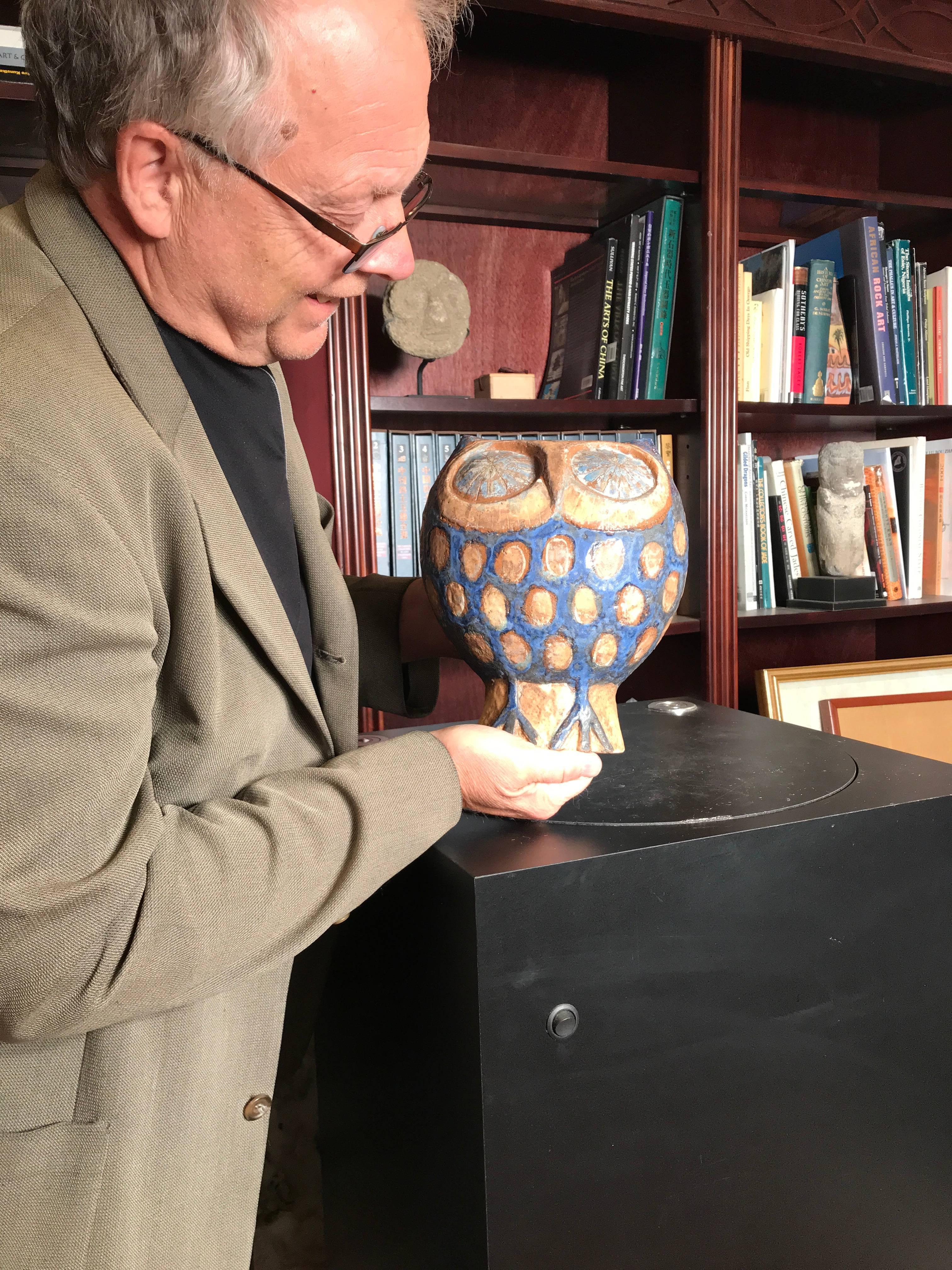 One of her most favorite Compositions!

Tall handmade and hand-painted owl sculpture handcrafted and hand-painted in beautiful colors
 
Designer/maker: Eva Fritz-Lindner (1933-2017) 

with model stamp on base circa 1960-1970

Glaze: The matte colors