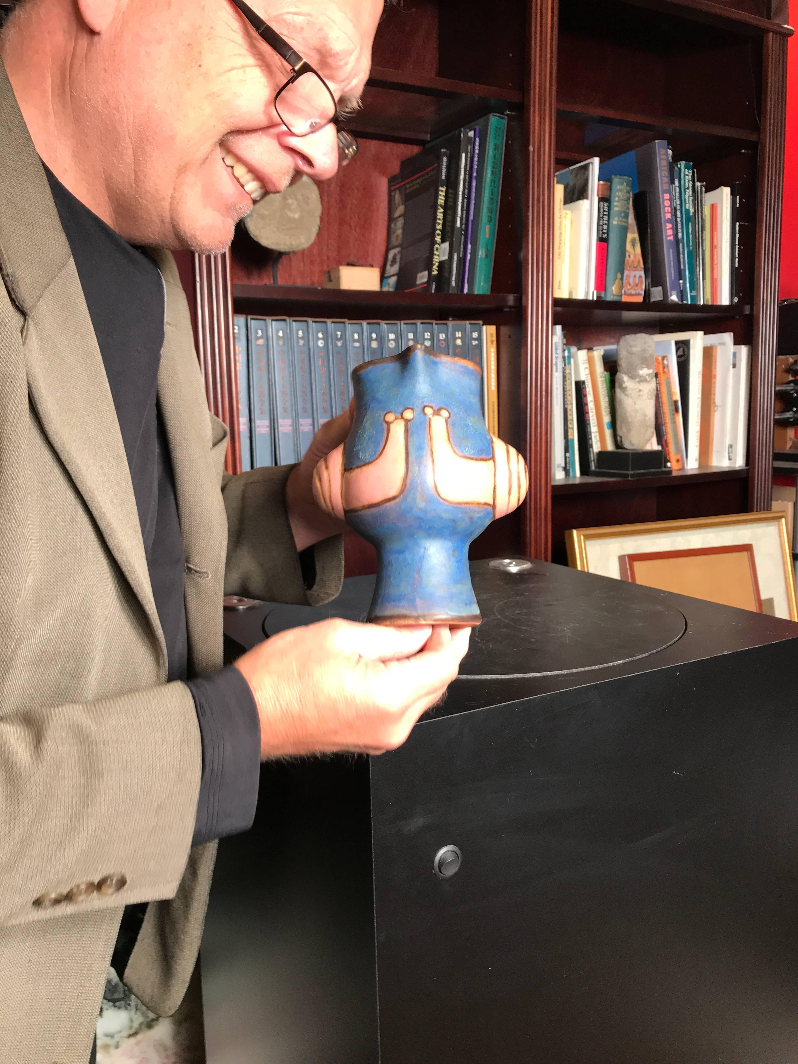 A creative Arts & Crafts handmade and hand-painted blue glazed pottery snails vase/pitcher form by master designer Eva Fritz-Lindner (1933-2017)

Hand-painted mark with stamp i3D, circa 1970.

Glaze: The matte colors are bright and vivid and the