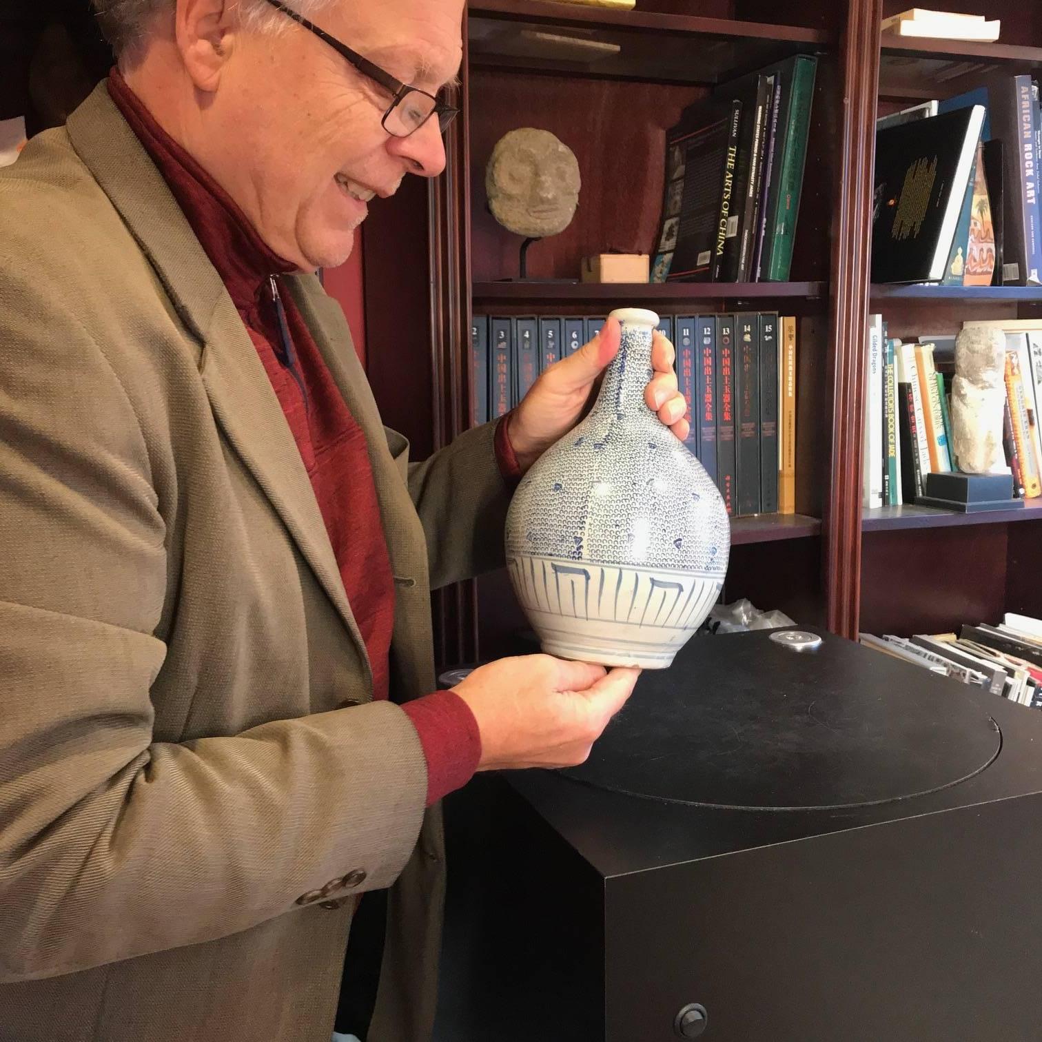 Here's a beautiful and unique way to accent your indoor space with this very unusual treasure found in Japan! 

This is a finely crafted, hand-painted Arita blue and white ceramic vase hand finished in a Classic Japanese Tako Karakusa octopus vine