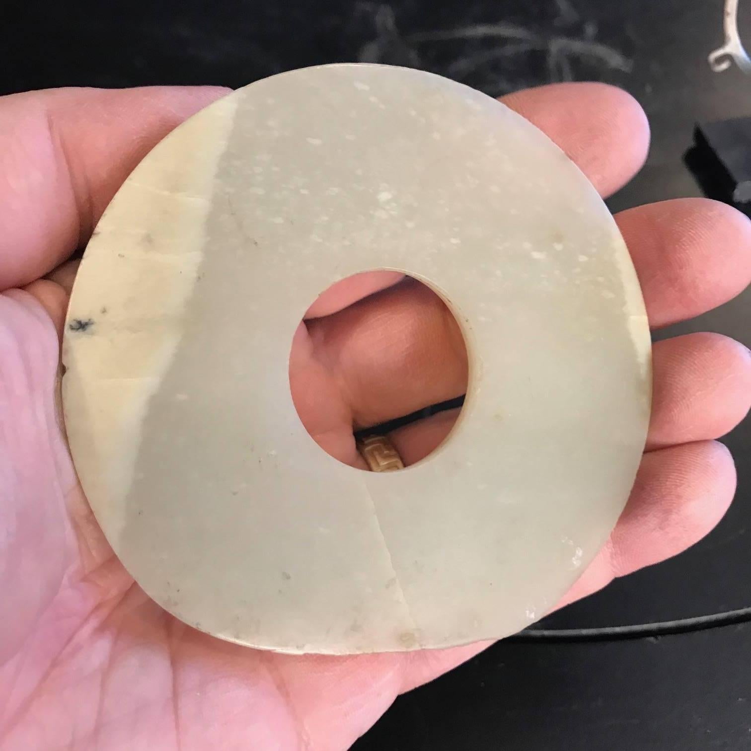 Important Ancient Chinese Heavenly Jade Bi Disc with Green and White Pattern In Good Condition In South Burlington, VT