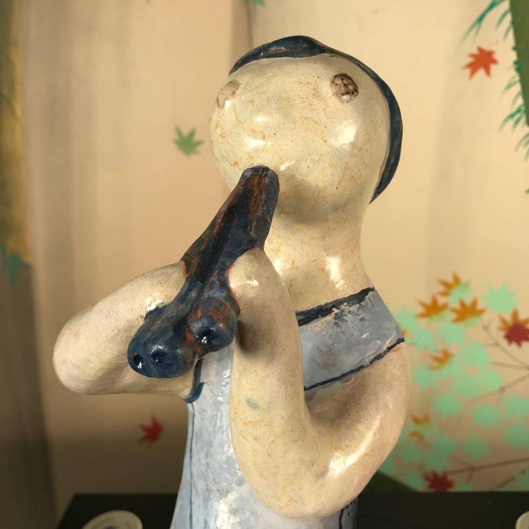 Hand-Crafted Vibrant Blue Flute Player 