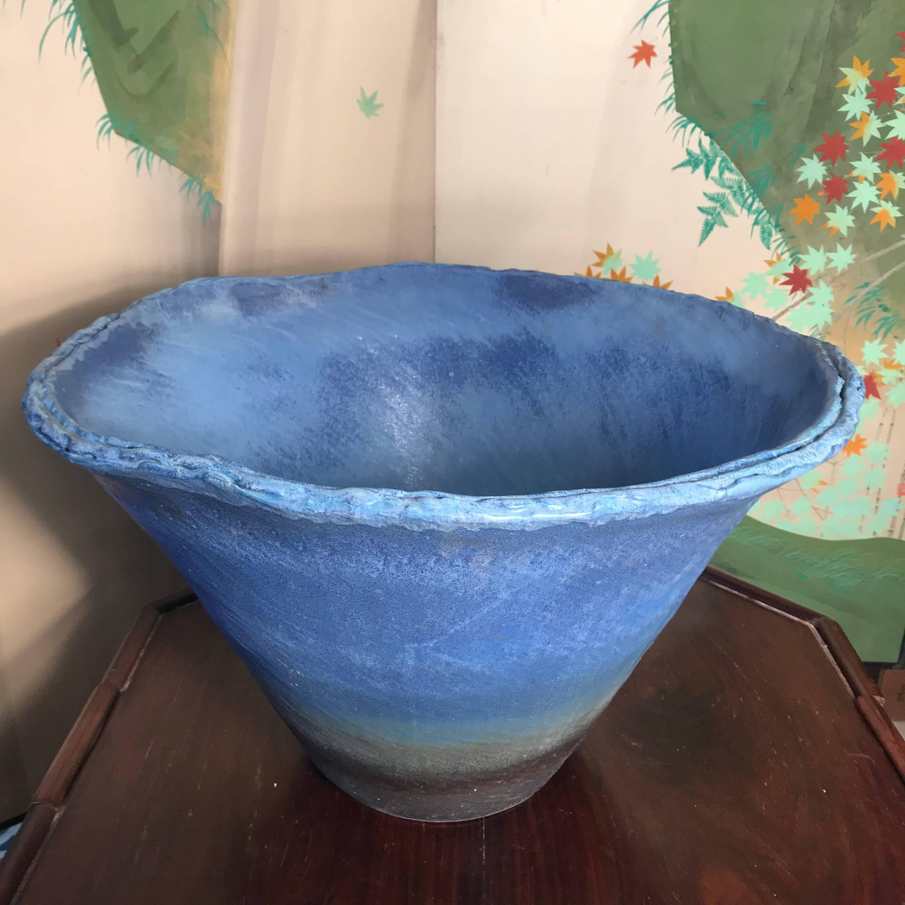 Japan, a big handsome, handmade, and hand glazed one-of-a-kind heavy thick stone ware vessel hand glazed in an attractive brilliant cobalt blue color and from unique Japanese clay called choseki (long life clay). This glazed planter or water vessel
