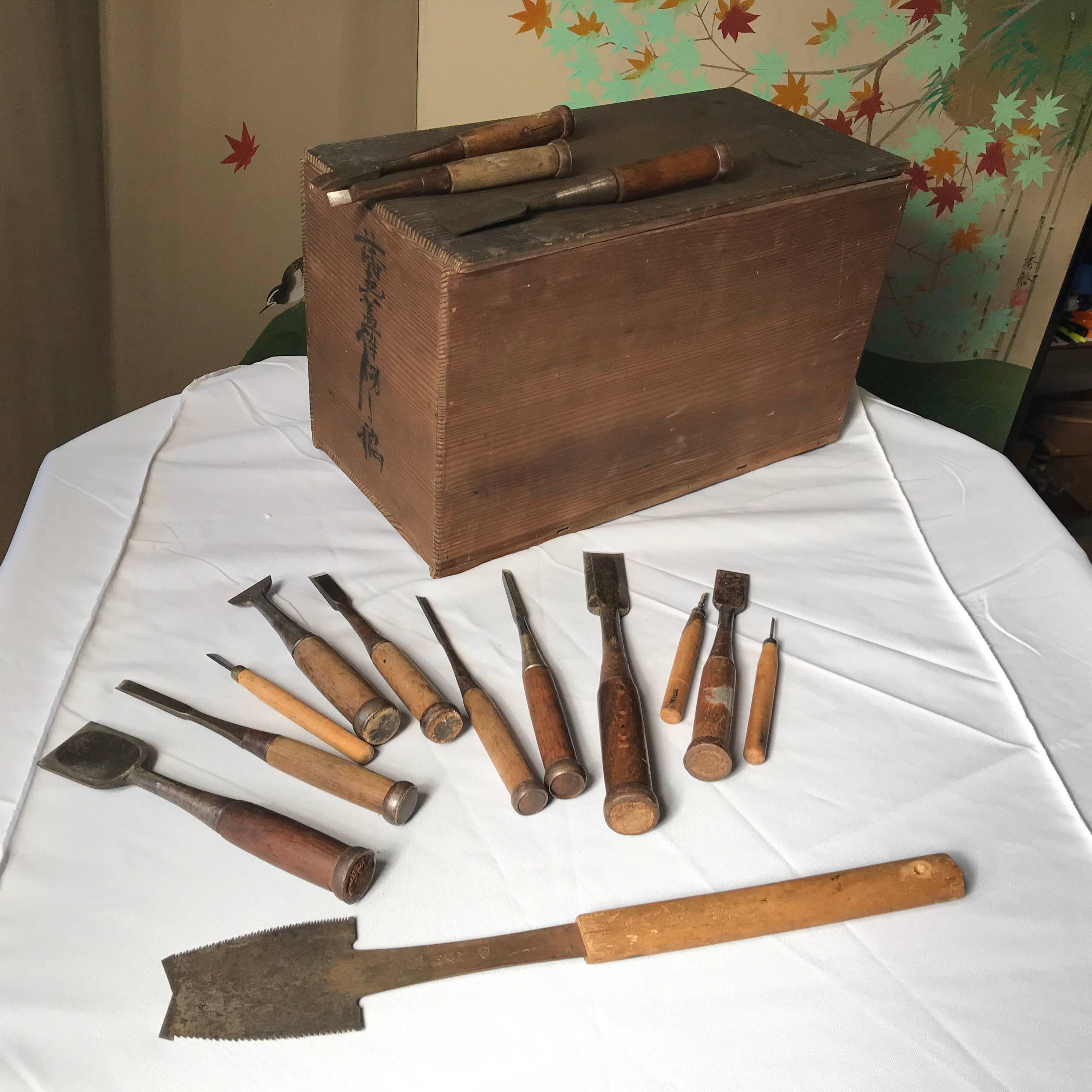 Here's a rare find from a collector we visited in Japan. A very unusual treasure from Japan. 

This is a cache box of 15 Old Japanese professional carpenter's carving and chisel tools, including fine tataki nomi timber chisels, dating back to the