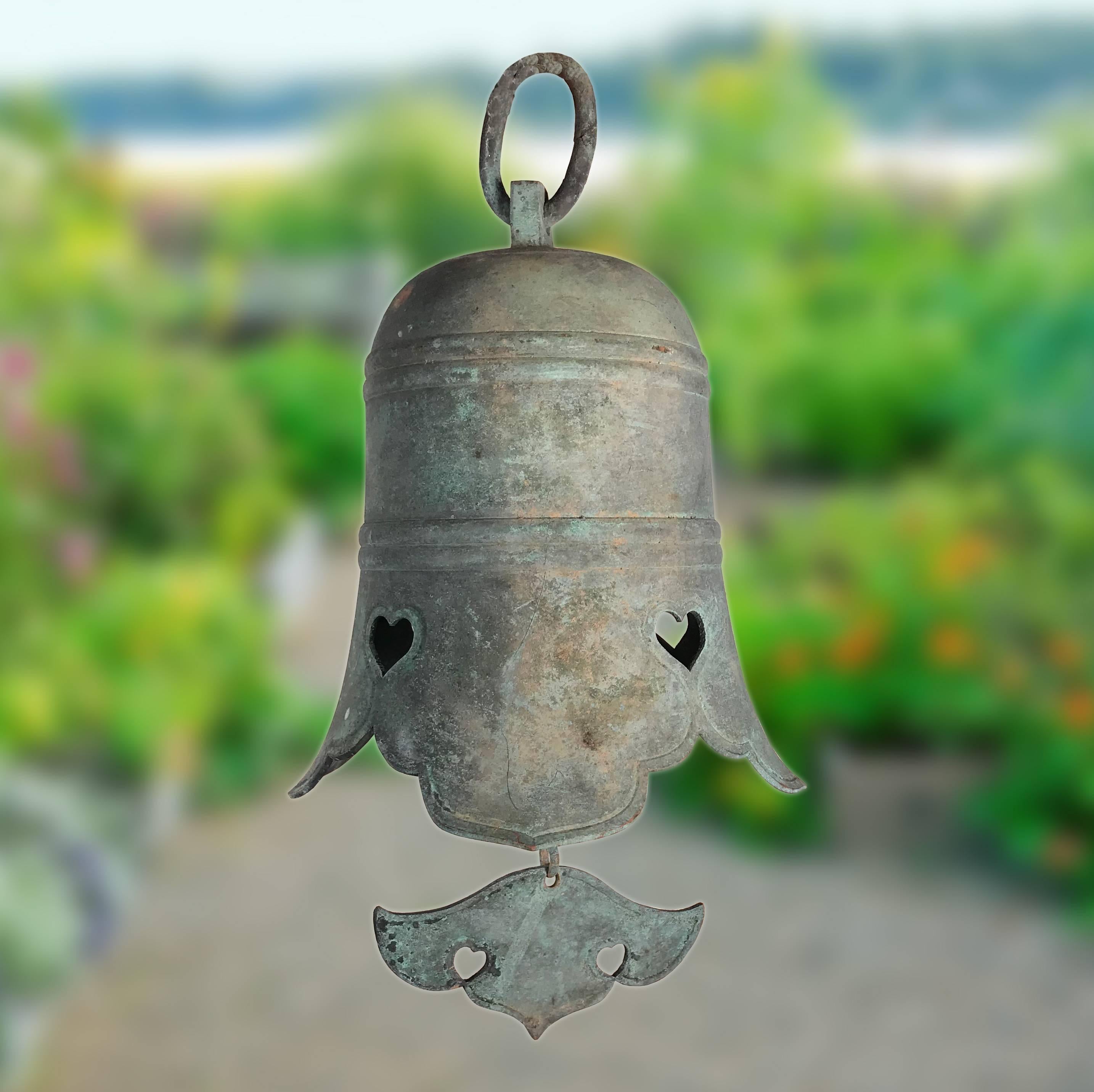 Here's a rare treasure from Japan and an unusual find- an excellent candidate to accent your indoor or outdoor garden space. 

This is a superb antique bronze casting of a wonderful medium to large-scale temple bell complete with its original cloud