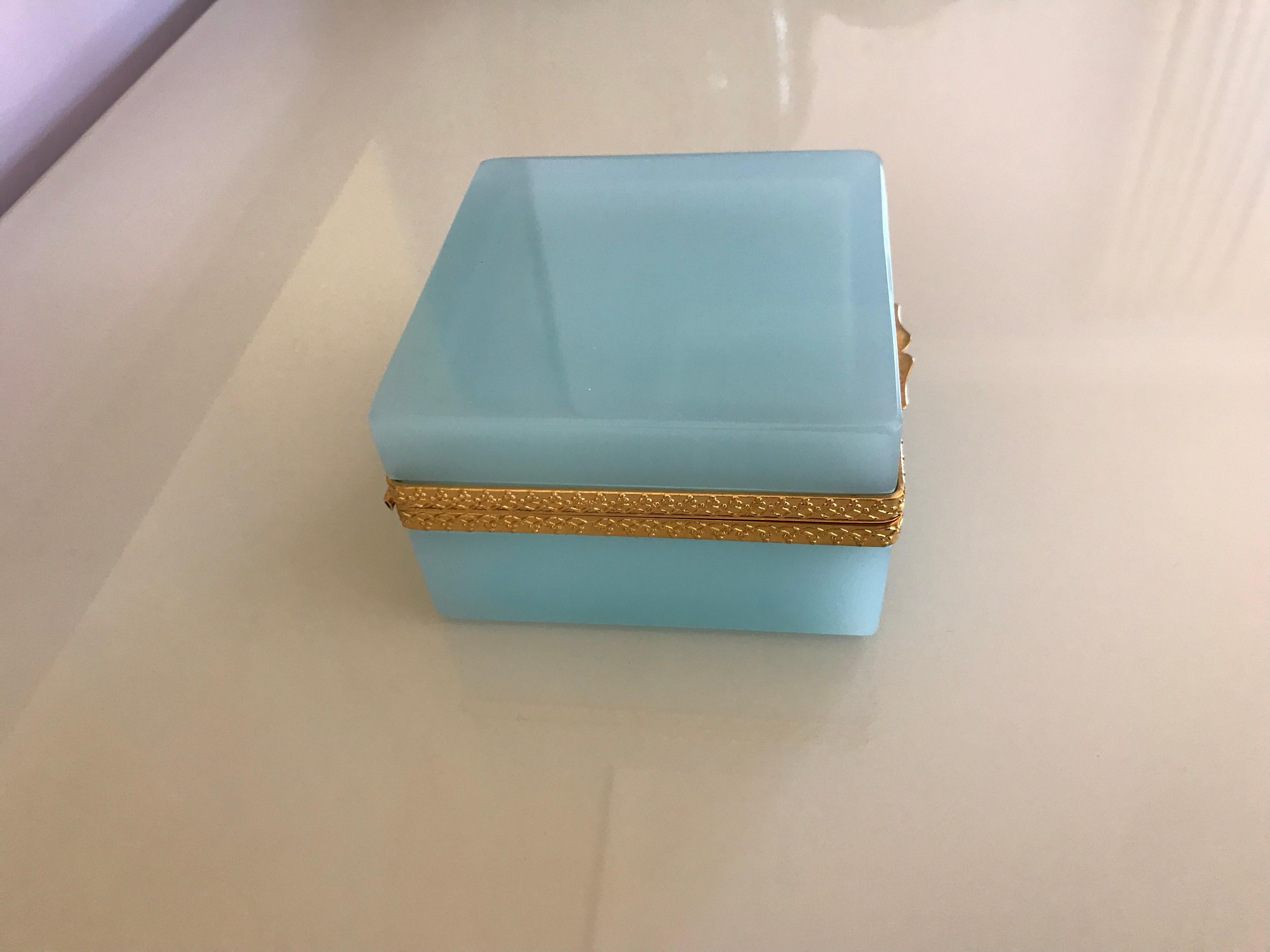 This is a pale blue opaline box from France.