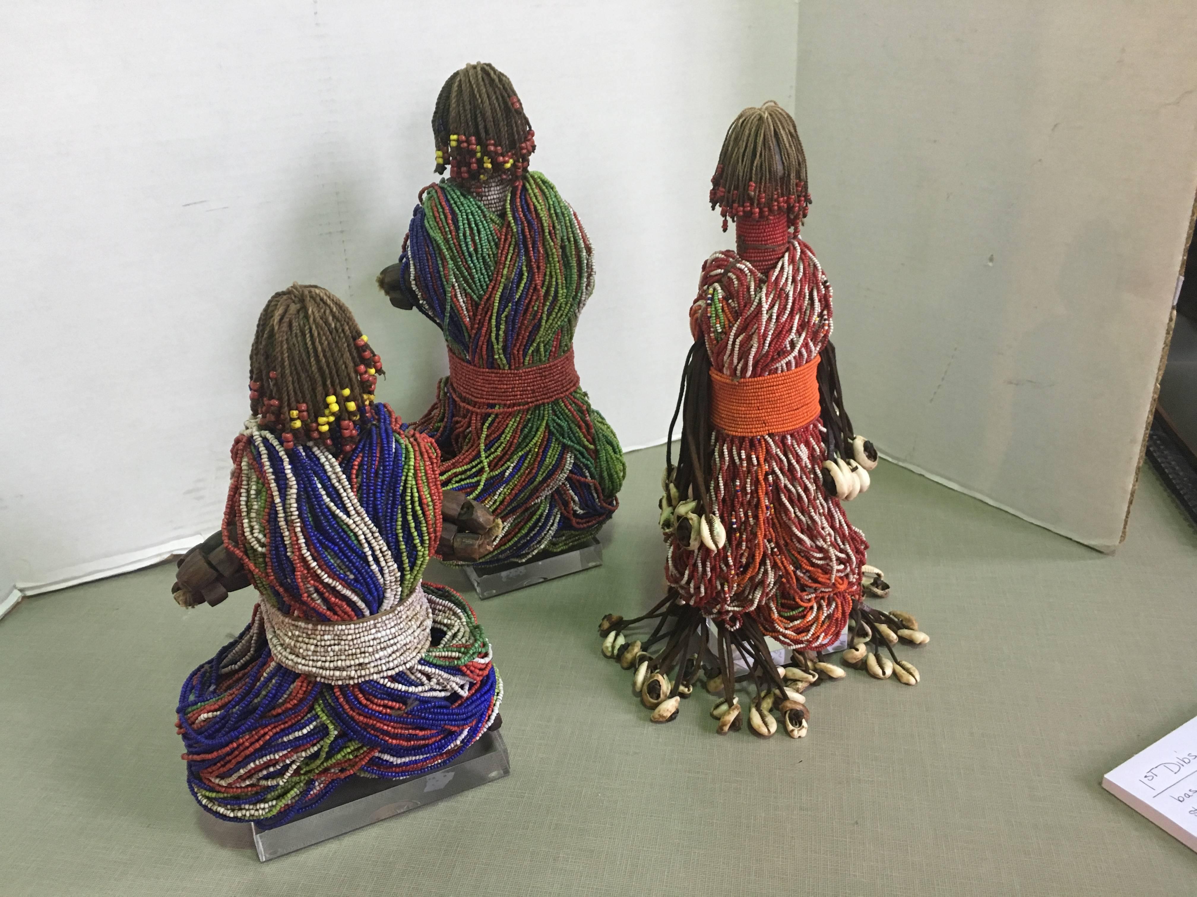 Three African Fali fertility dolls from Cameroon.

Measures: Blue one 10.5x 6.5 x 5.

Green one 13.5 x 6 x 4.5.

Orange one 12.5 x 5.5 x 3.5.