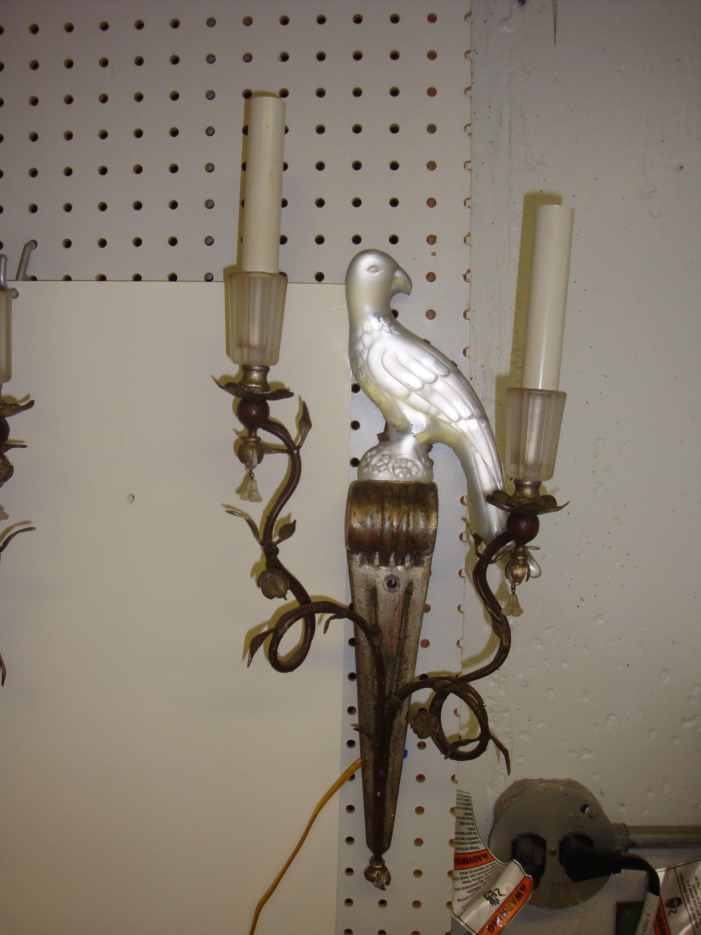 Pair of French frosted glass bird sconces are mounted on silvered bases and have two armed lights with fluted frosted bobeches.