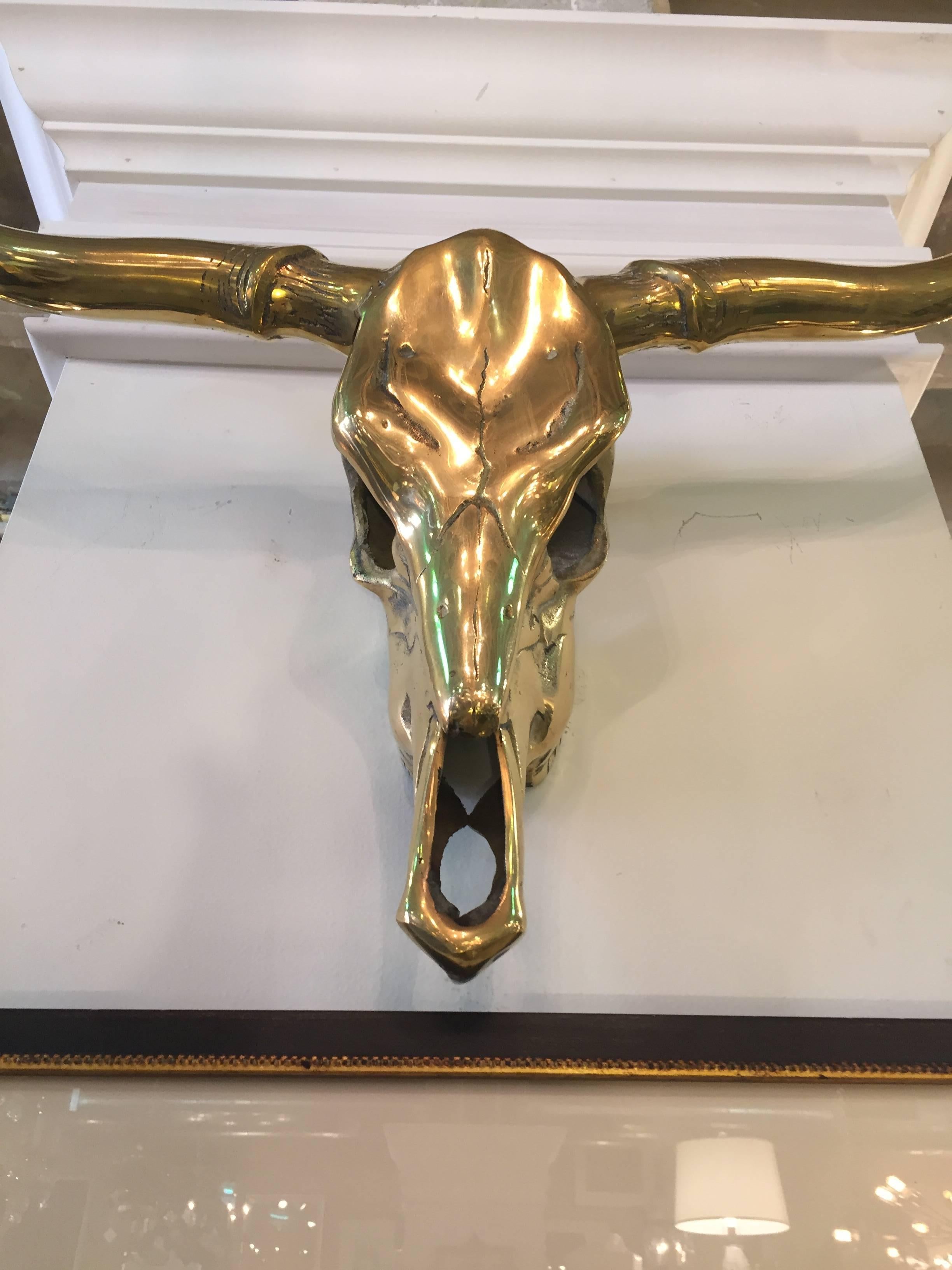 1960s solid brass steer horn skull wall decoration.