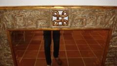 Hand-Carved Giltwood Scrolled Mirror by Harrison and Gil