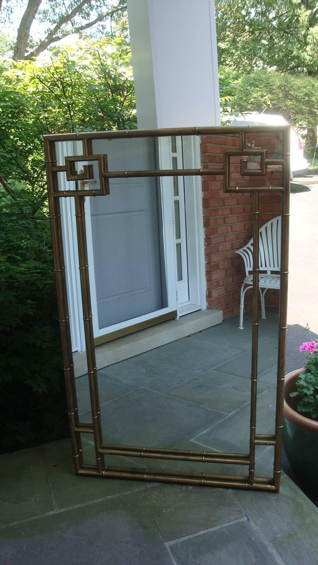 This is a heavy Brass Greek key design mirror from 1980s.