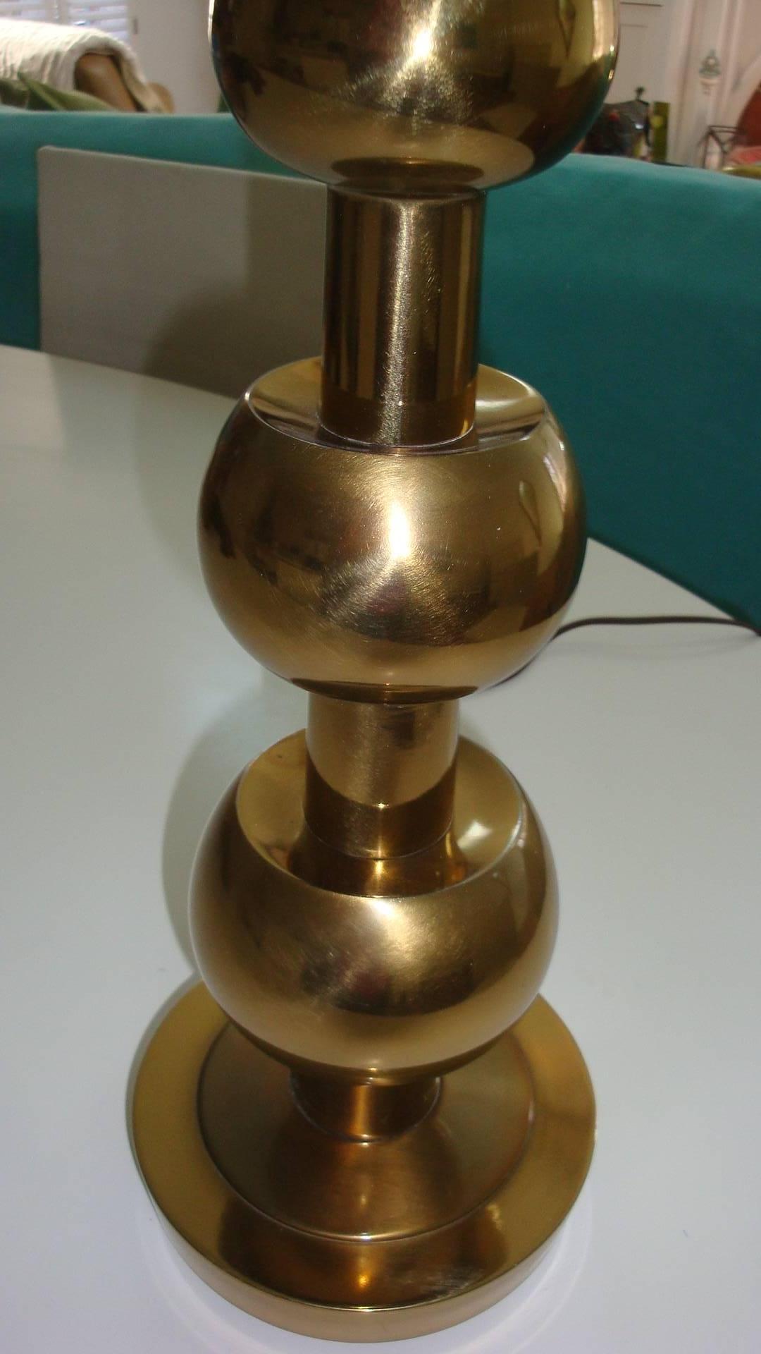 This is a vintage three round ball brass lamp from the 1950s-1960s its made by Stiffel.