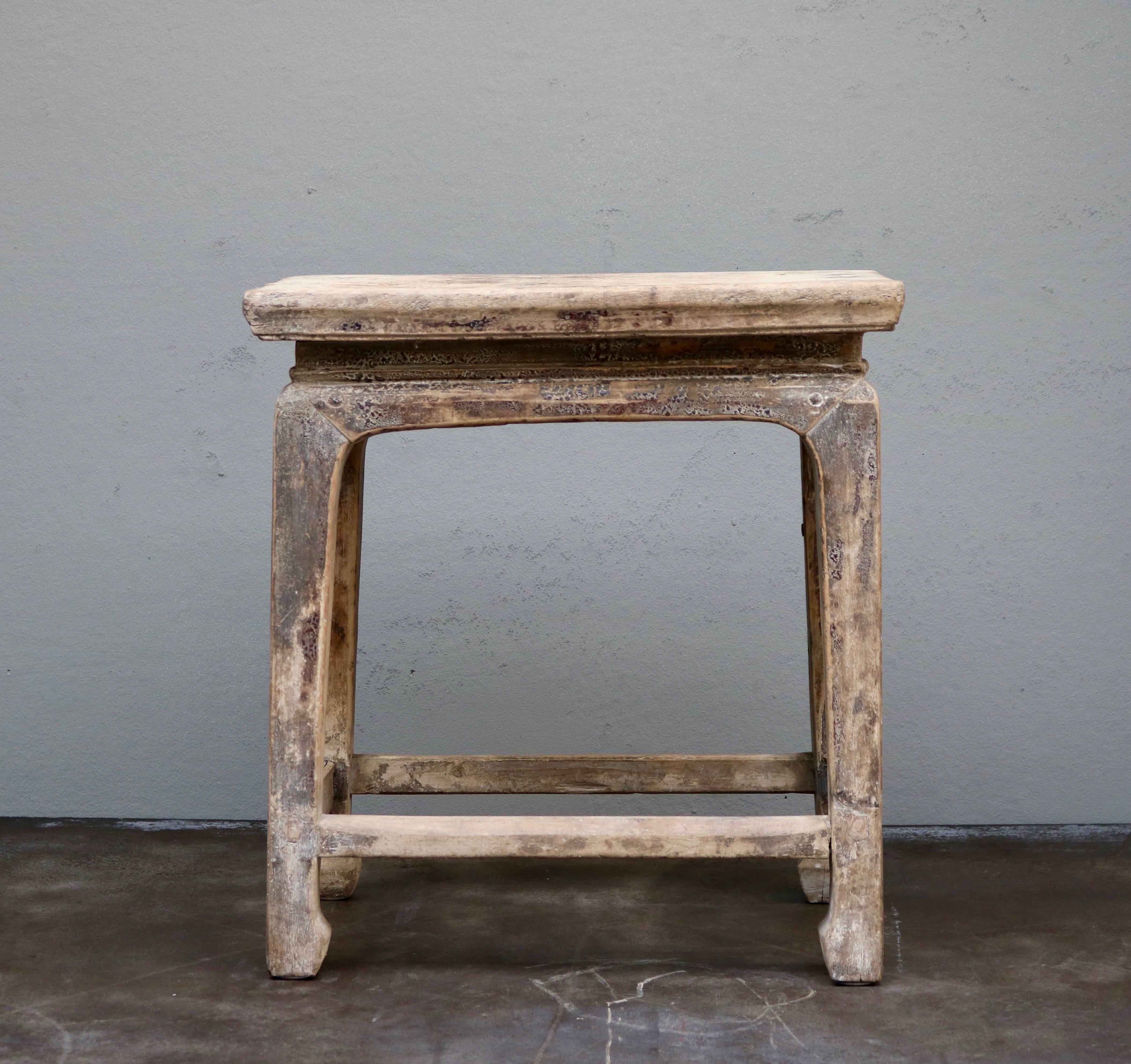 Stool made in ancient Chinese elmwood from the 19th century. Originally from the Shanxi Province in China.