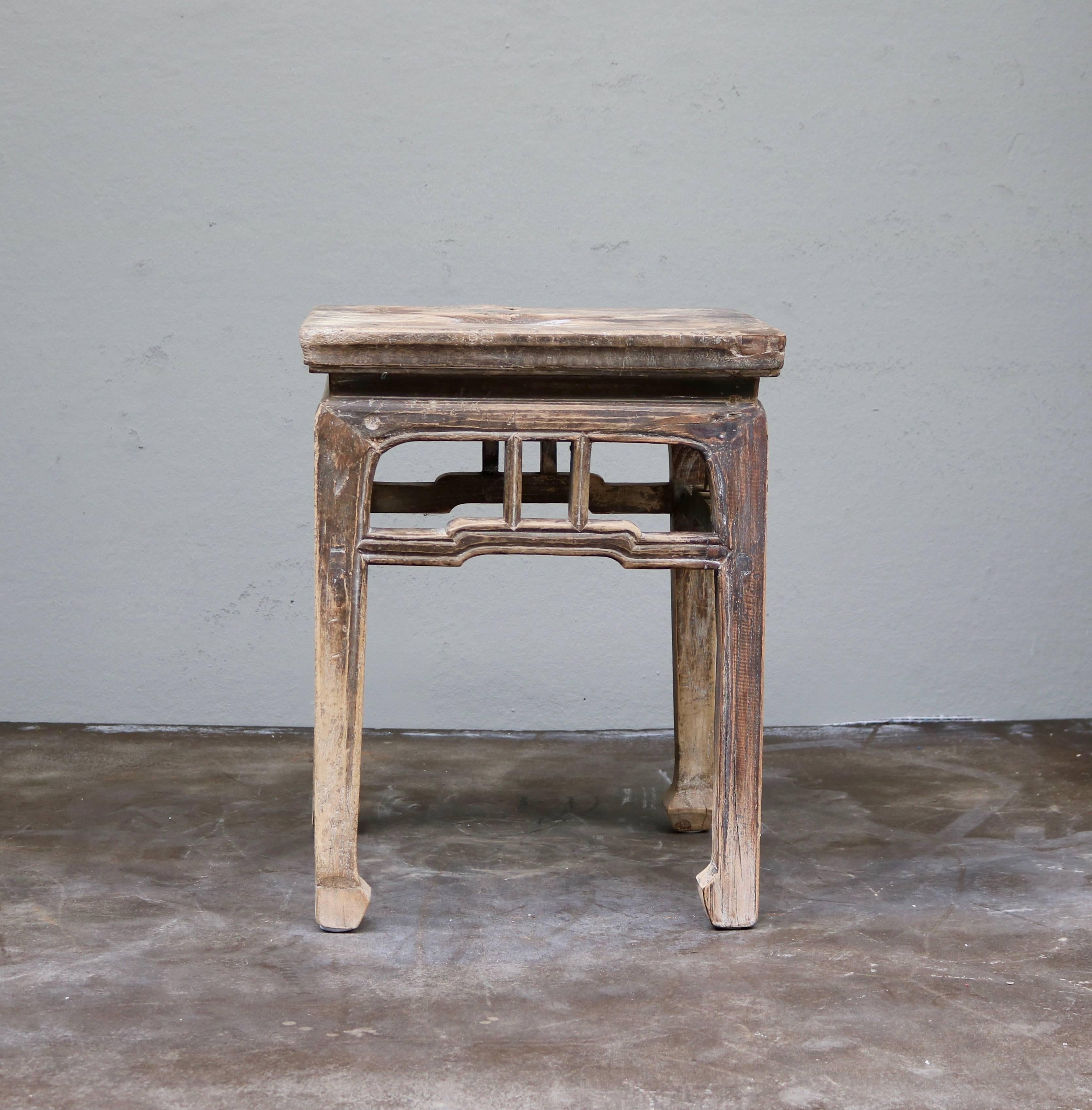Stool made in ancient Chinese elmwood from the 19th century. Originally from the Shanxi province in China.