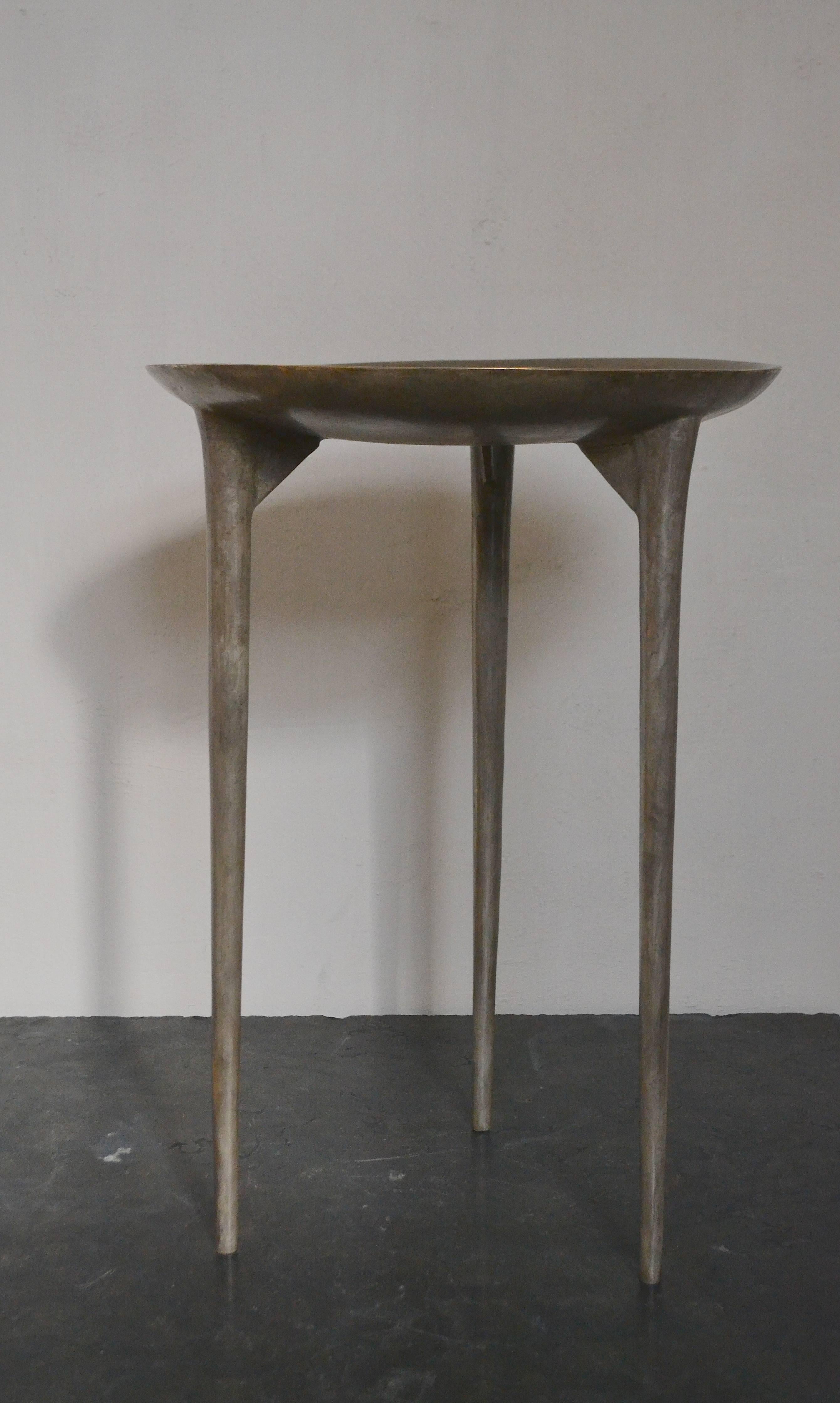 Rick Owens 'Tall Brazier' three-legged table in solid bronze with nitrate finish.