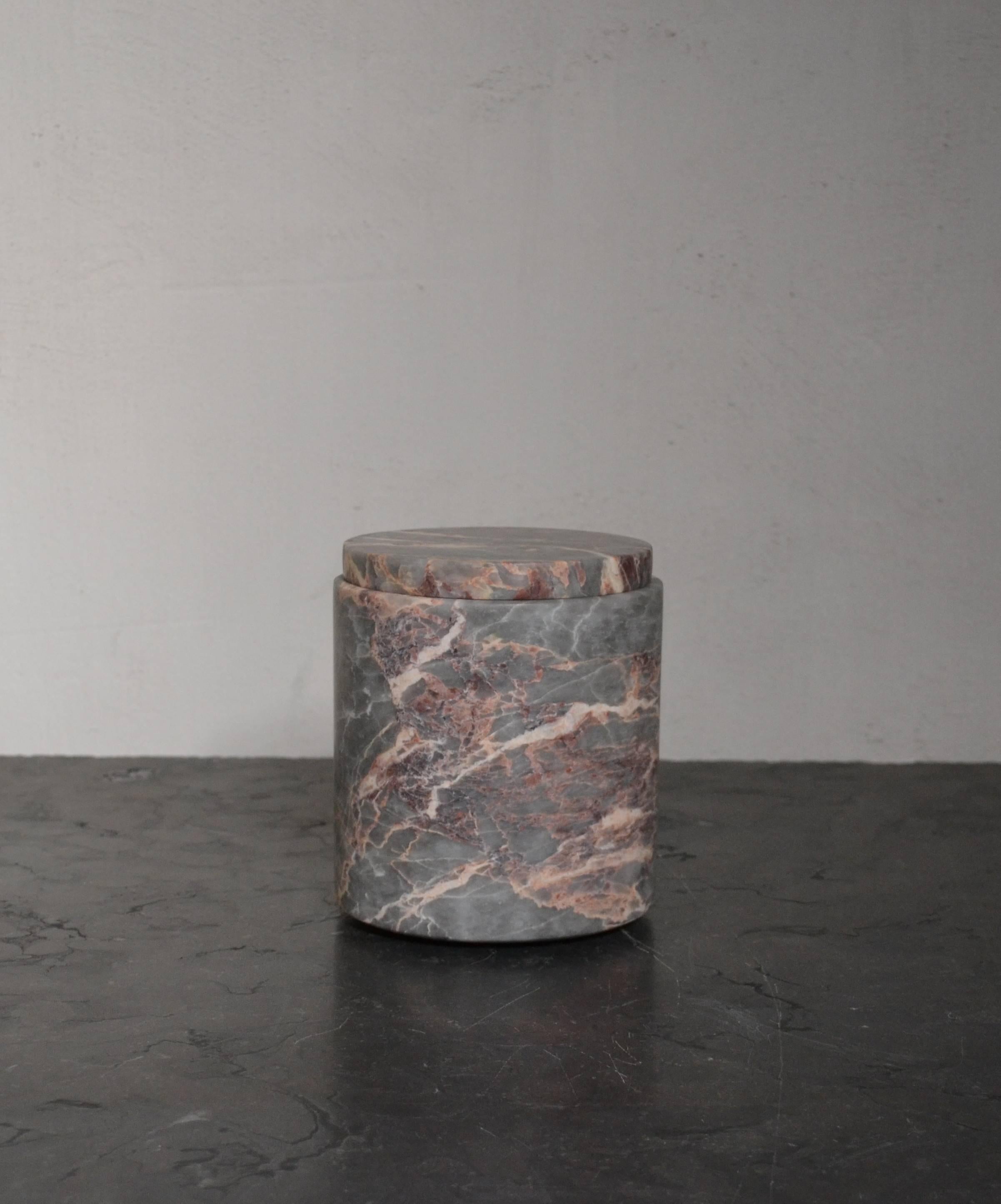 Beautiful and unique large jar with lid from Michaël Verheyden in salome marble in color grey/ burgundy antico. Slightly curved bottom.