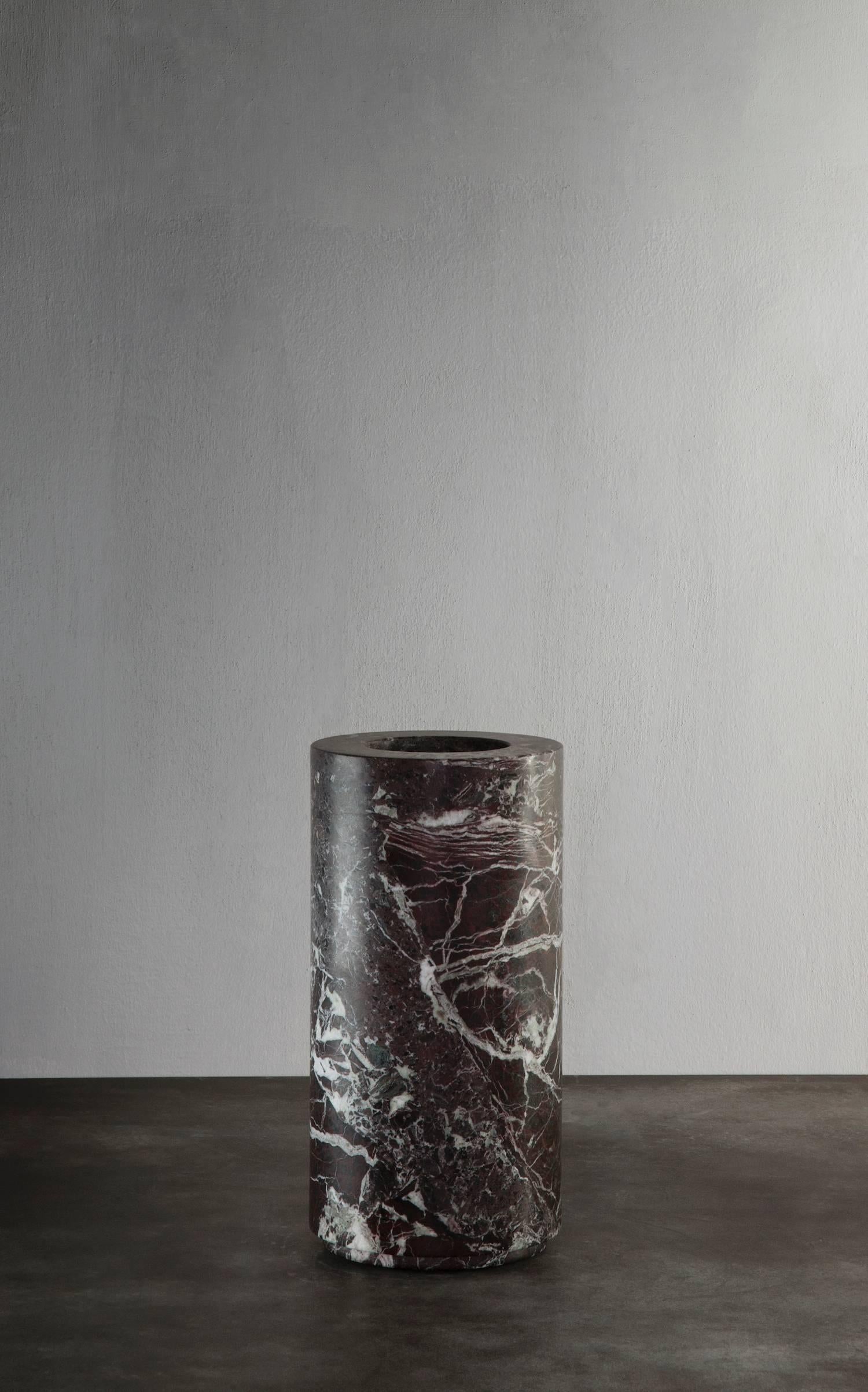 Large cylindrical shaped vase in dark bordeaux marble - 'rosso levanto marble' from Michaël Verheyden.
Please note: This item is located in our New York City Studio and will be shipped from there.