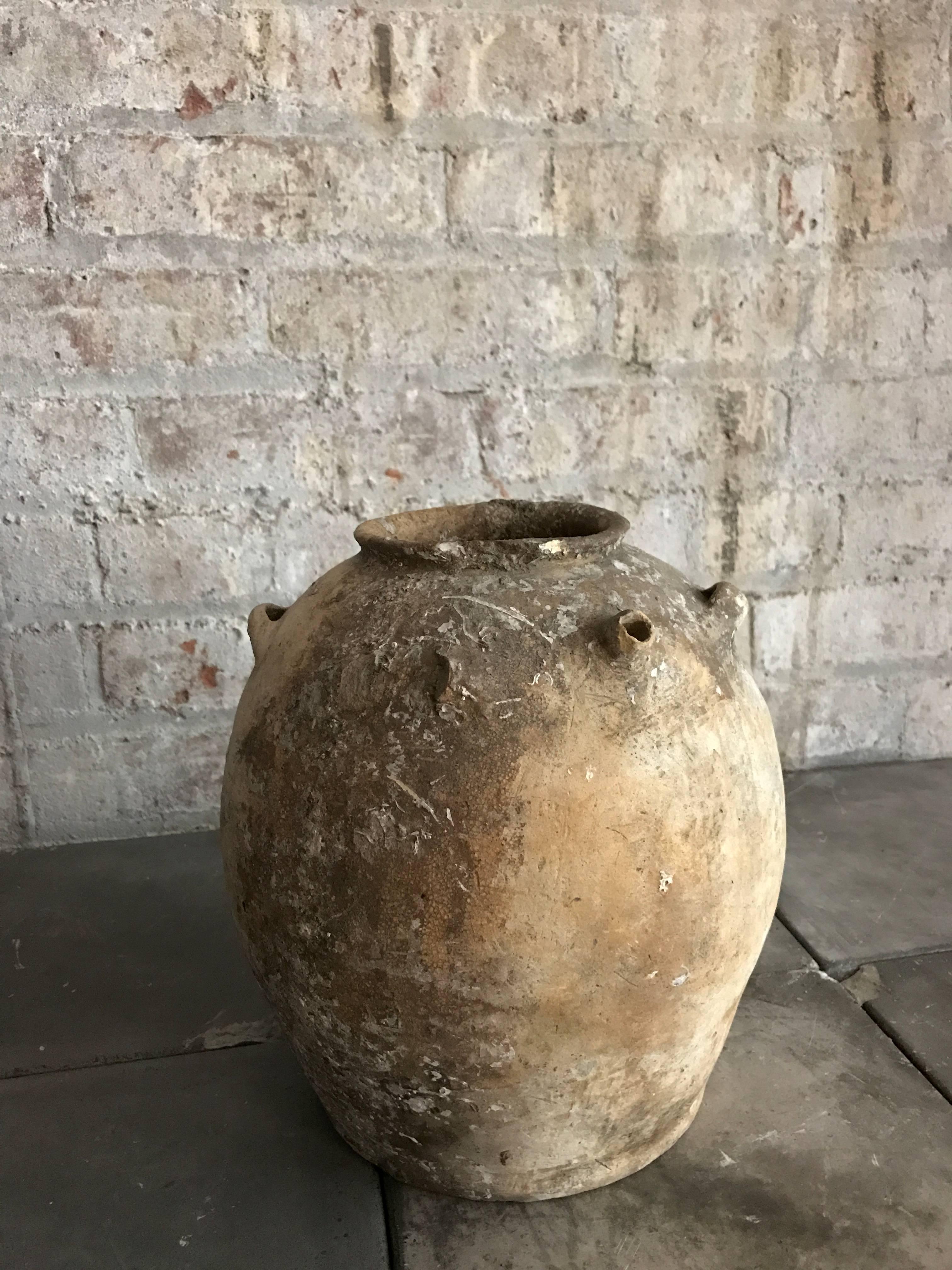 Old Khmer honey jar.
Please note: This item is located in our New York City Studio and will be shipped from there.