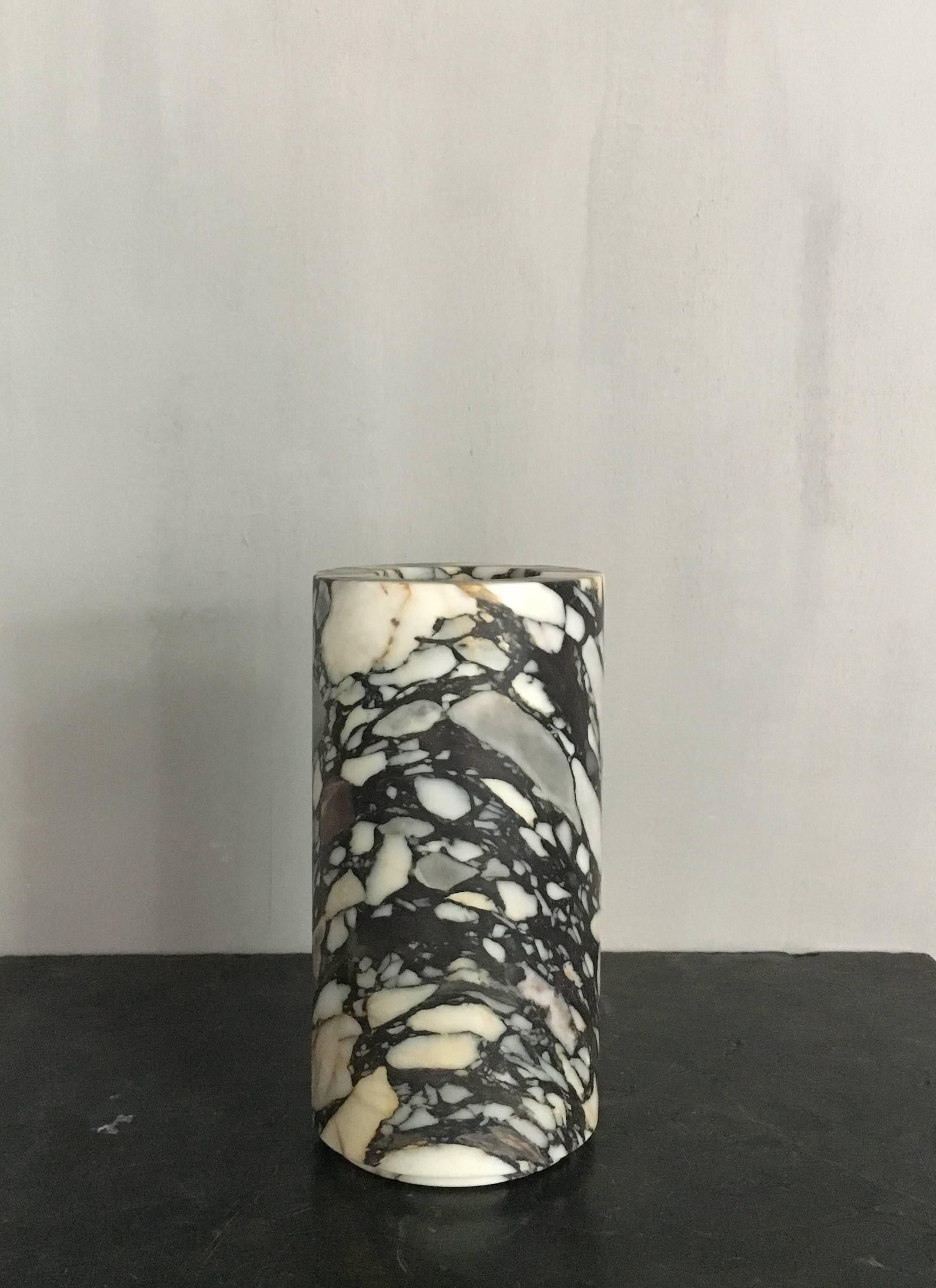 Unique and beautiful large cylindrical shaped marble vase from Michaël Verheyden with very thick edges.