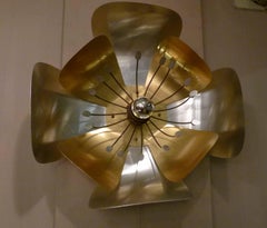 Pair of Circular Sconces in Cut and Folded Metal circa 1970