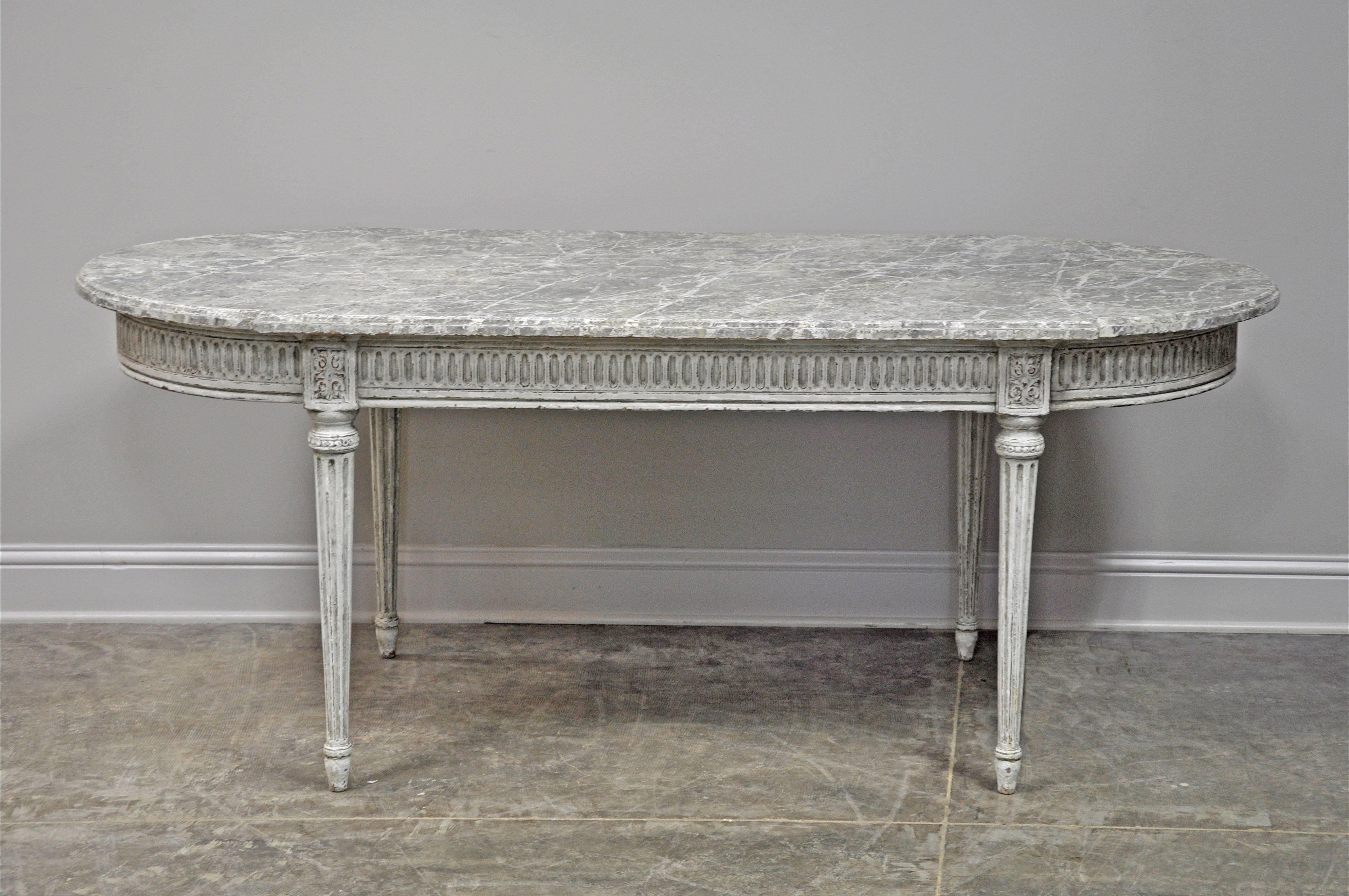 Painted French Louis XVI style Classic dining table with faux painted top and multi-layered, 'distressed' finish.

Established in 1979, Joyce Horn Antiques, ltd. continues its 36 year tradition of being a family owned and operated business