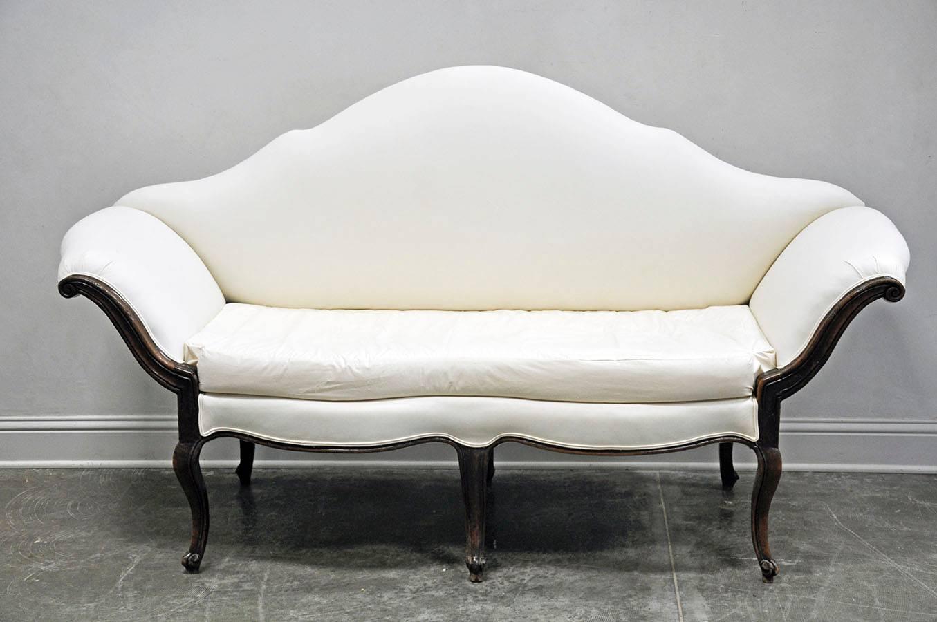 18th century Italian canape with French Louis XV style influence in walnut. Classic Northern Italian styling in nice size and proportion with beautiful patina. Newly upholstered in muslin, the removable back makes this a very versatile addition to