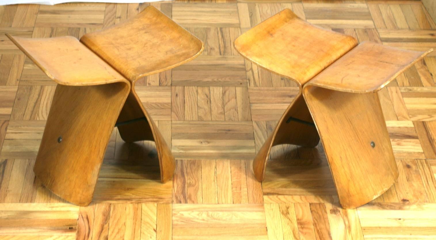 Pair of period Sori Yanagi butterfly stools sold in original condition. Molded plywood with veener.
Structurally sound, with some discoloration and later varnishing,
1950s, Japan.