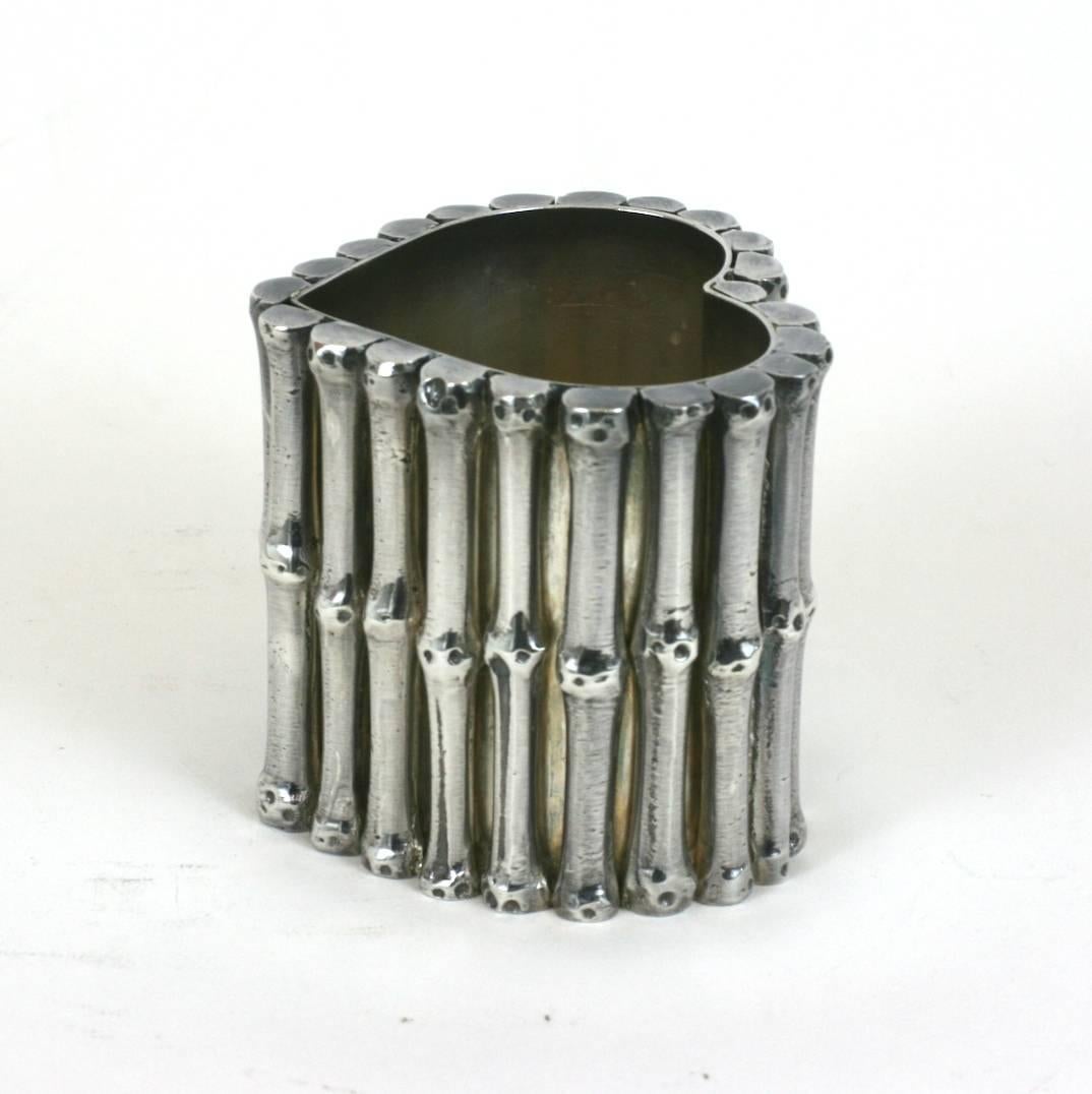 Unusual silver plated bronze pen holder, retailed by Bonwit Teller, N.Y. Composed of faux bamboo stalks in a heart shaped form. Very heavy, great quality, made in Italy, 1970s. 3.5