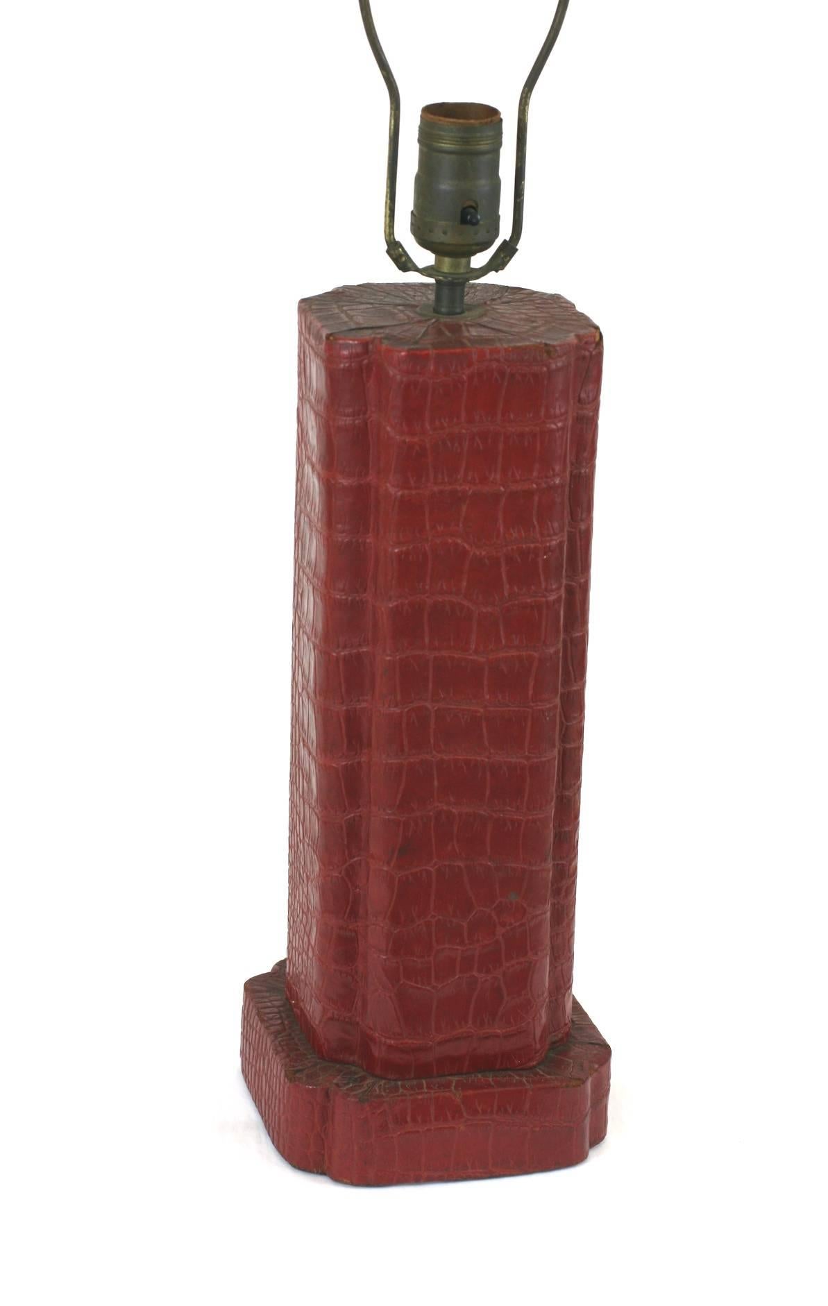 Karl Springer attributed Alligator grained skin lamp in burgundy leather. Cool aesthetic. 1970s USA. Original wiring. 
Lamp and base measures 5.5 square by 13.5