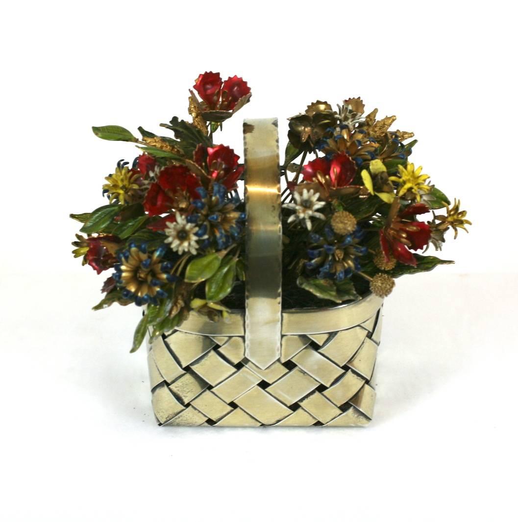 Cartier sterling enamel flower basket, handmade with various flowers, all hand enameled in different colorful shades. Basket base is also made of handwoven sterling. Charming decorative table ornament. Excellent condition.