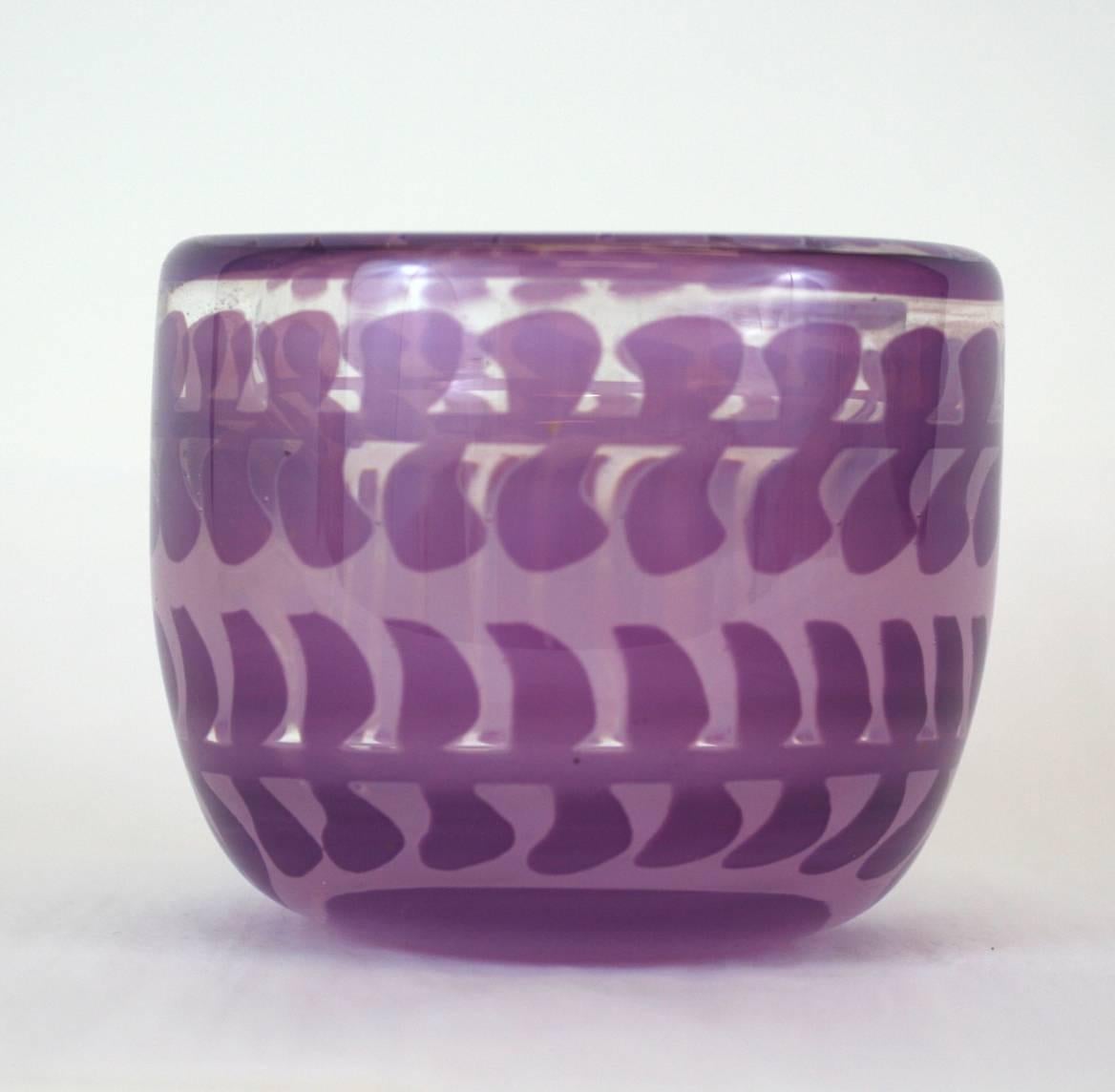 Beautiful, heavy Ariel glass vase with abstract designs in unusual tones of lilac and purple, Design by Ingeborg Lundin, Orrefors, Sweden 1965.
Maker/Stamp, Orrefors, Ariel, nr 613 O, Ingeborg Lundin
Measures: 5.25
