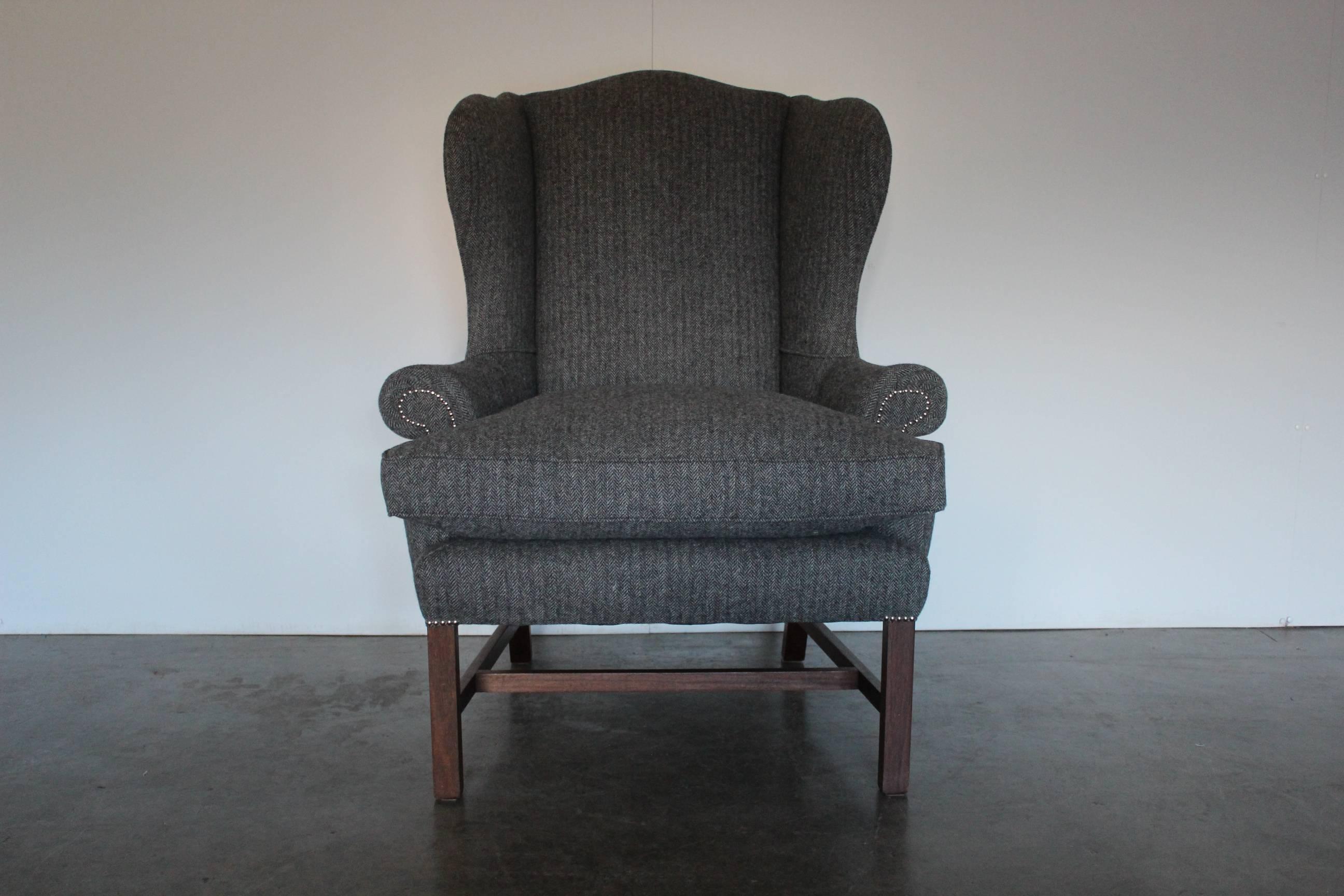 On offer on this occasion is an incredibly rare, large Ralph Lauren “Devonshire” wing-back armchair, dressed in a peerless, top-grade, Ralph Lauren Woollen Herringbone fabric in a myriad of beautiful dark black and grey tones, and with