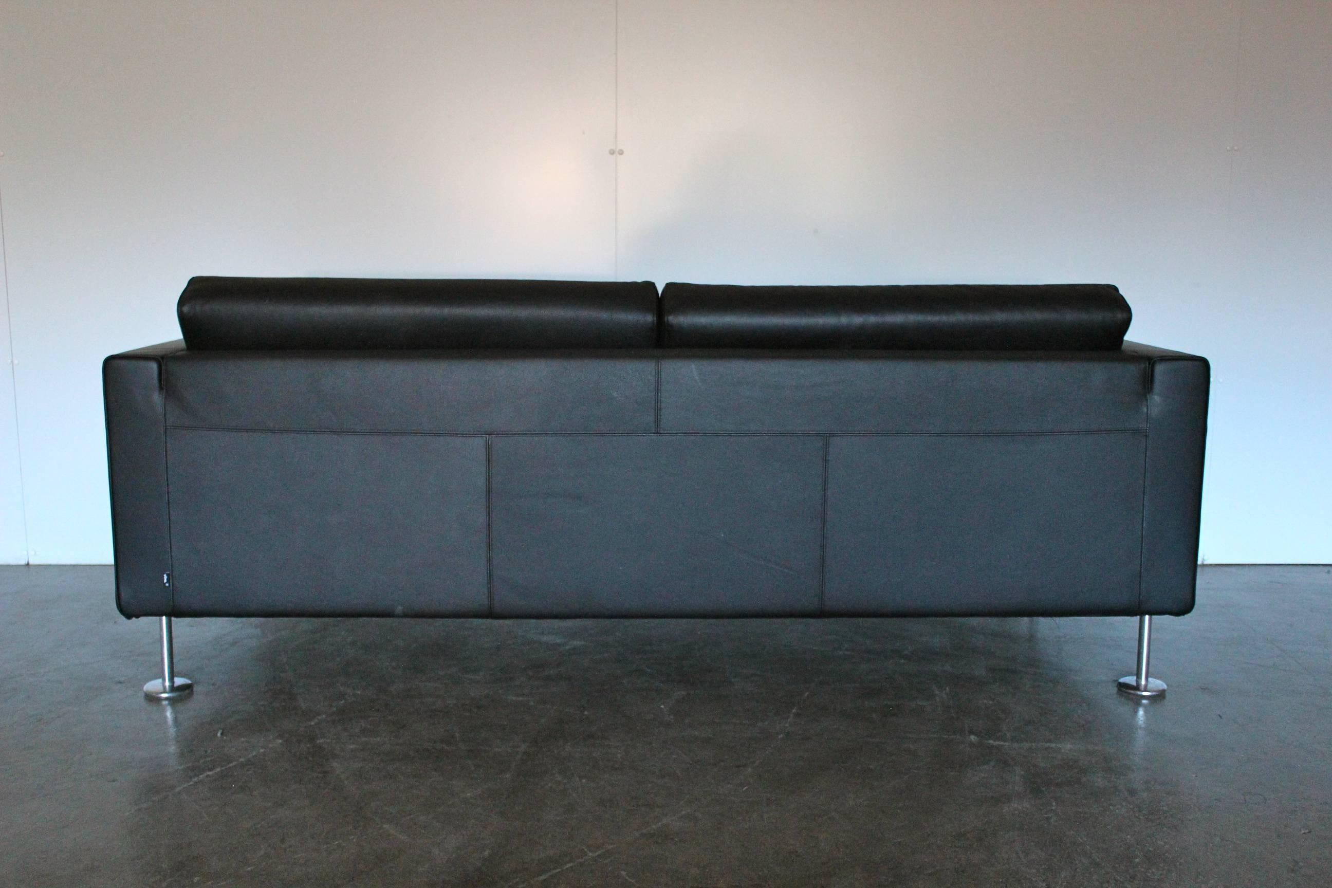On offer on this occasion is an ultra-rare, pristine “Park” three-seat sofa (one of 2 identical examples currently available) dressed in a high-grade jet-black leather, from the world renown Swiss furniture house of Vitra.

As you will no doubt be