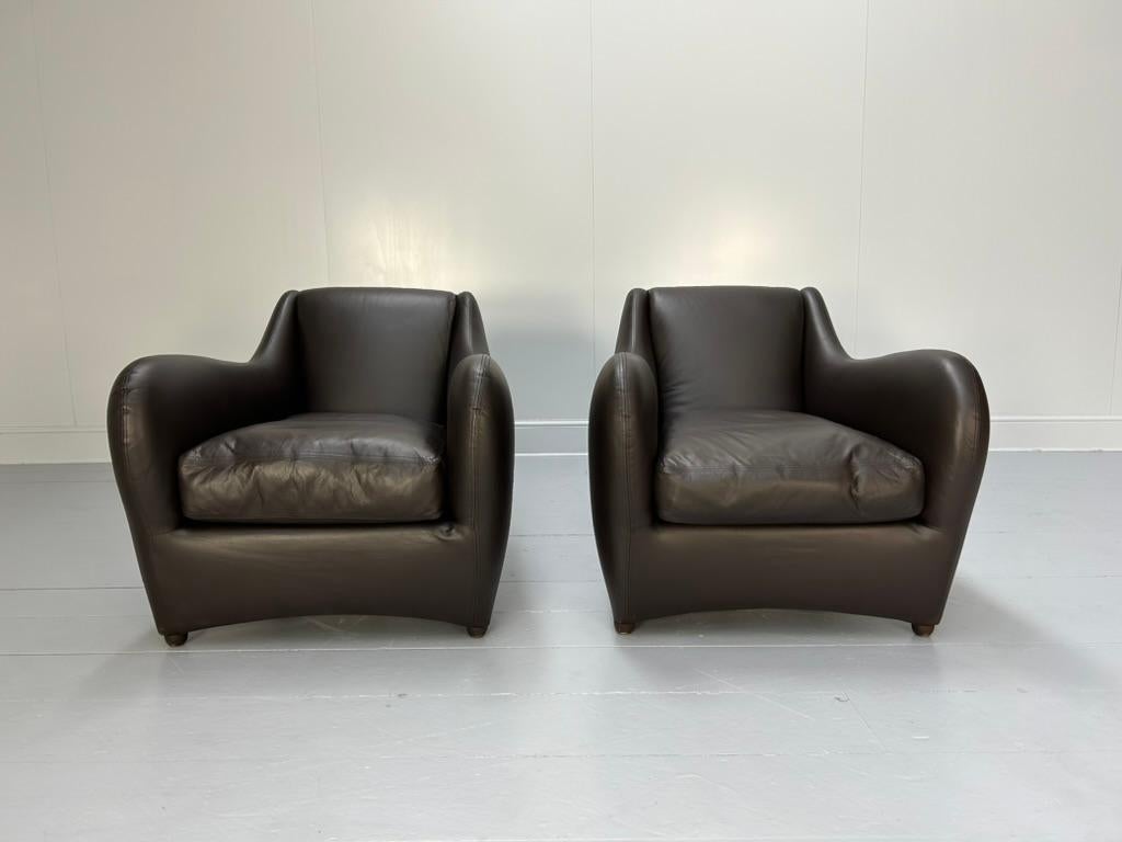 Paire de fauteuils et pouf 