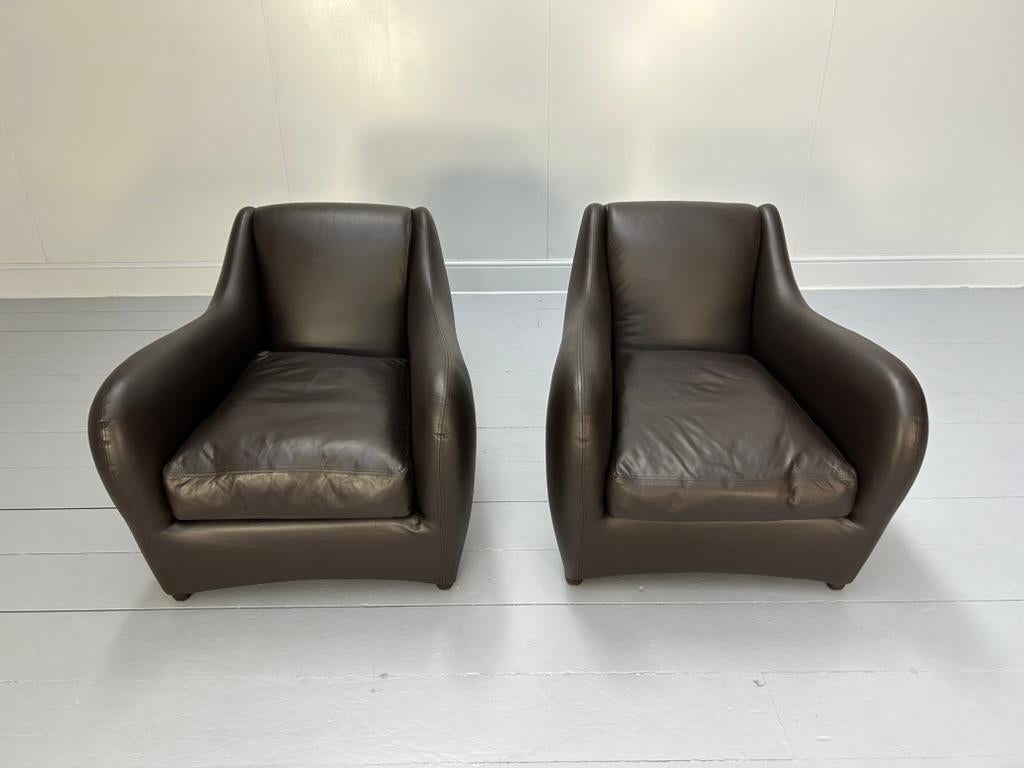 Paire de fauteuils et pouf 