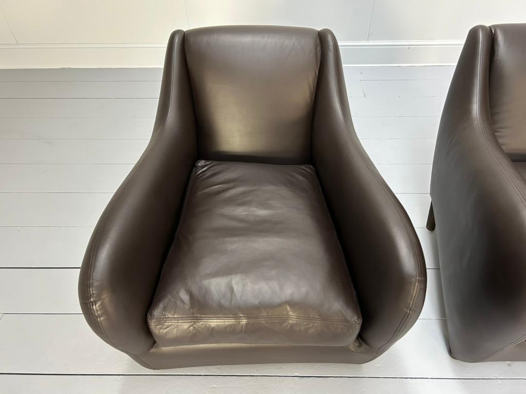 Paire de fauteuils et pouf 