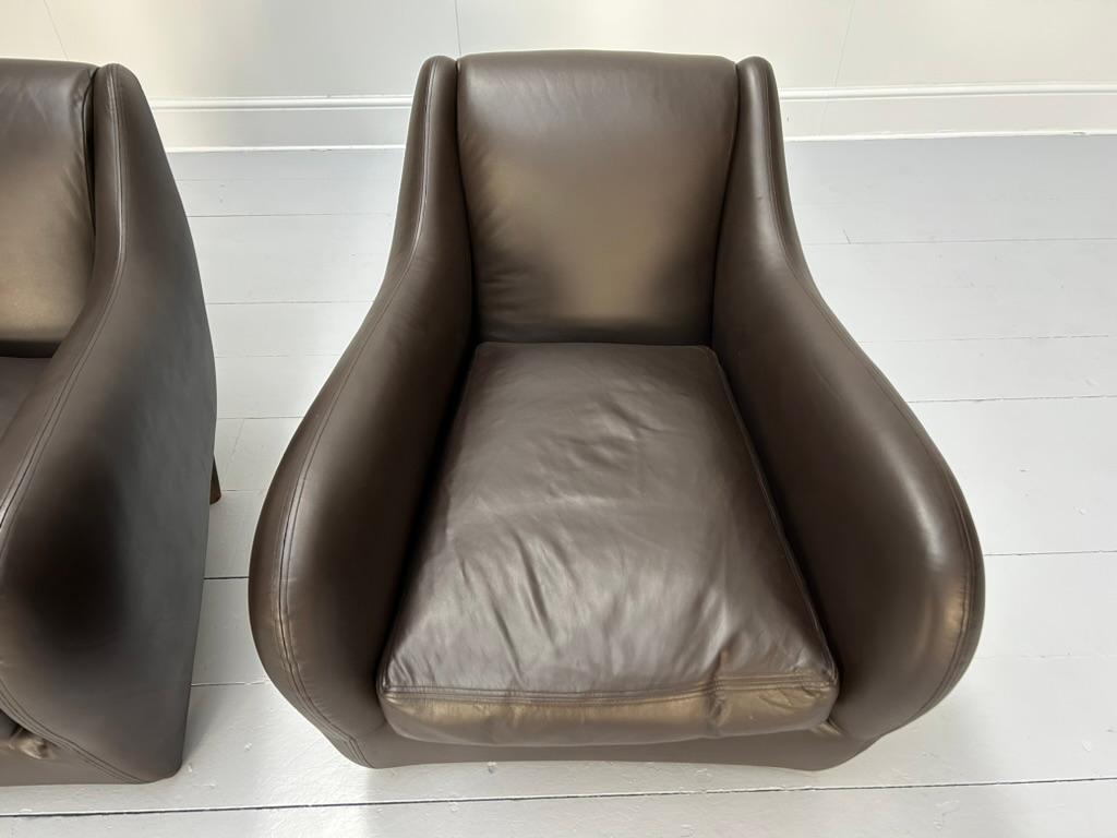 Paire de fauteuils et pouf 