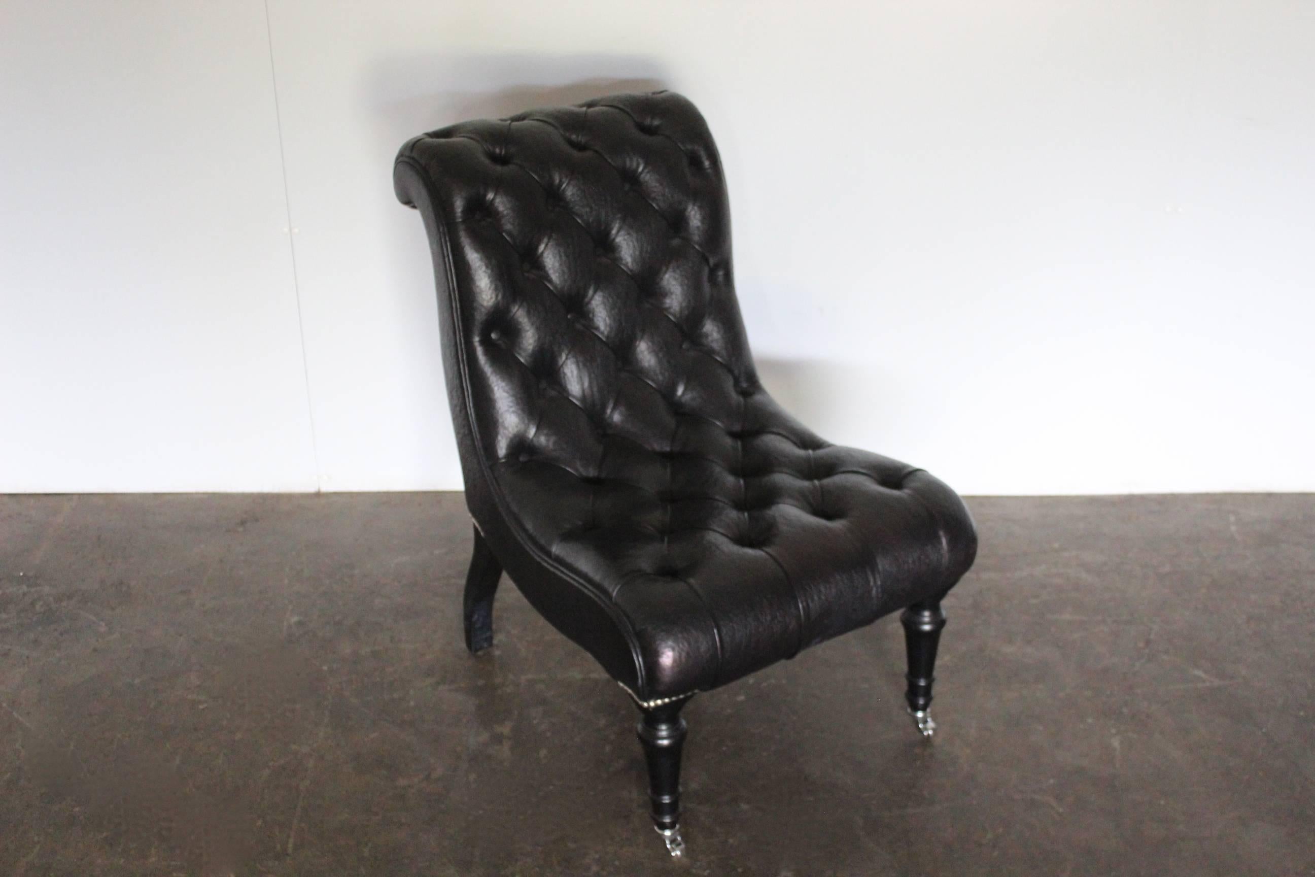 On offer on this occasion is a superb “Brewster” Armchair, dressed in a Peerless, top-grade, special-order textured-leather in Jet Black. Presented with Dark Mahogany legs and Polished-Chrome detail.

As you will no doubt be aware by your interest