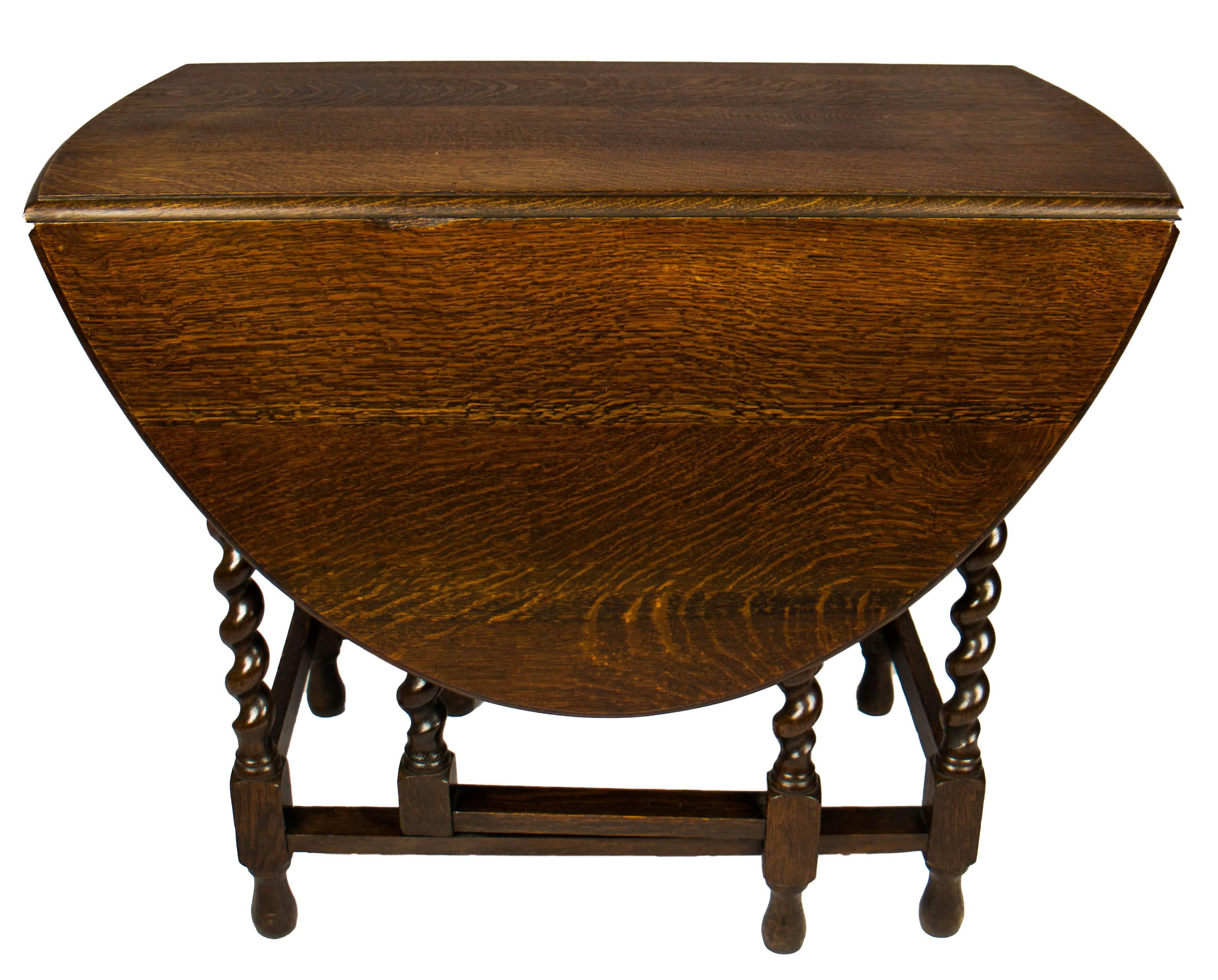 Early 19th century oak, barely twist gateleg table, English, circa 1900. 

Closed:
36