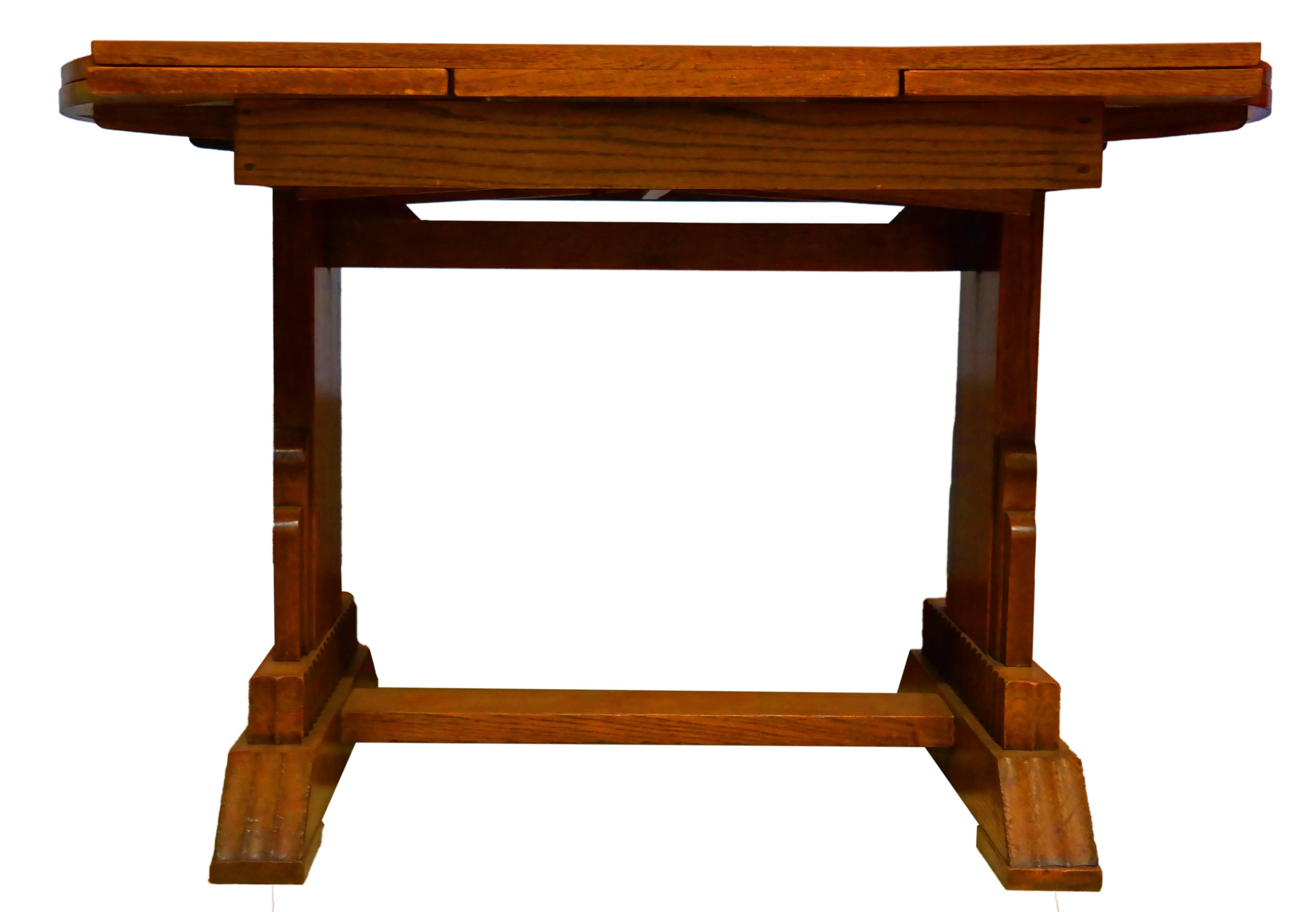 1930s Art Deco golden oak draw-leaf extendable dining table with a trestle base.

Regular Dimension = 36.5
