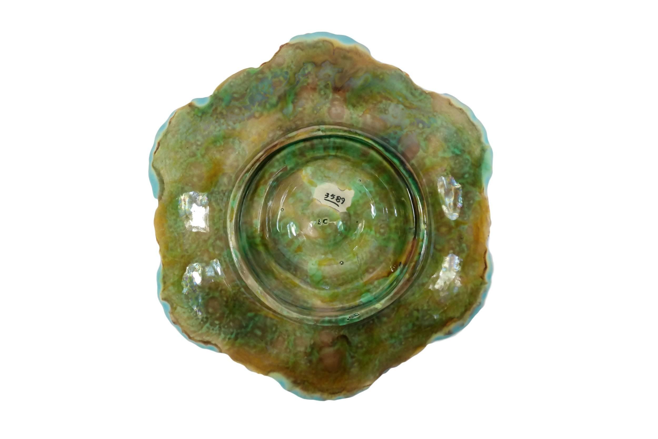 George Jones oyster plate in turquoise, with central well, pattern number to reverse (3589).


Marilyn G. Karmason and Joan B. Stake, Majolica: A Complete History and Illustrated Survey, New York: Harry Abrams Publishers, 1989, illustrated, p. 96.