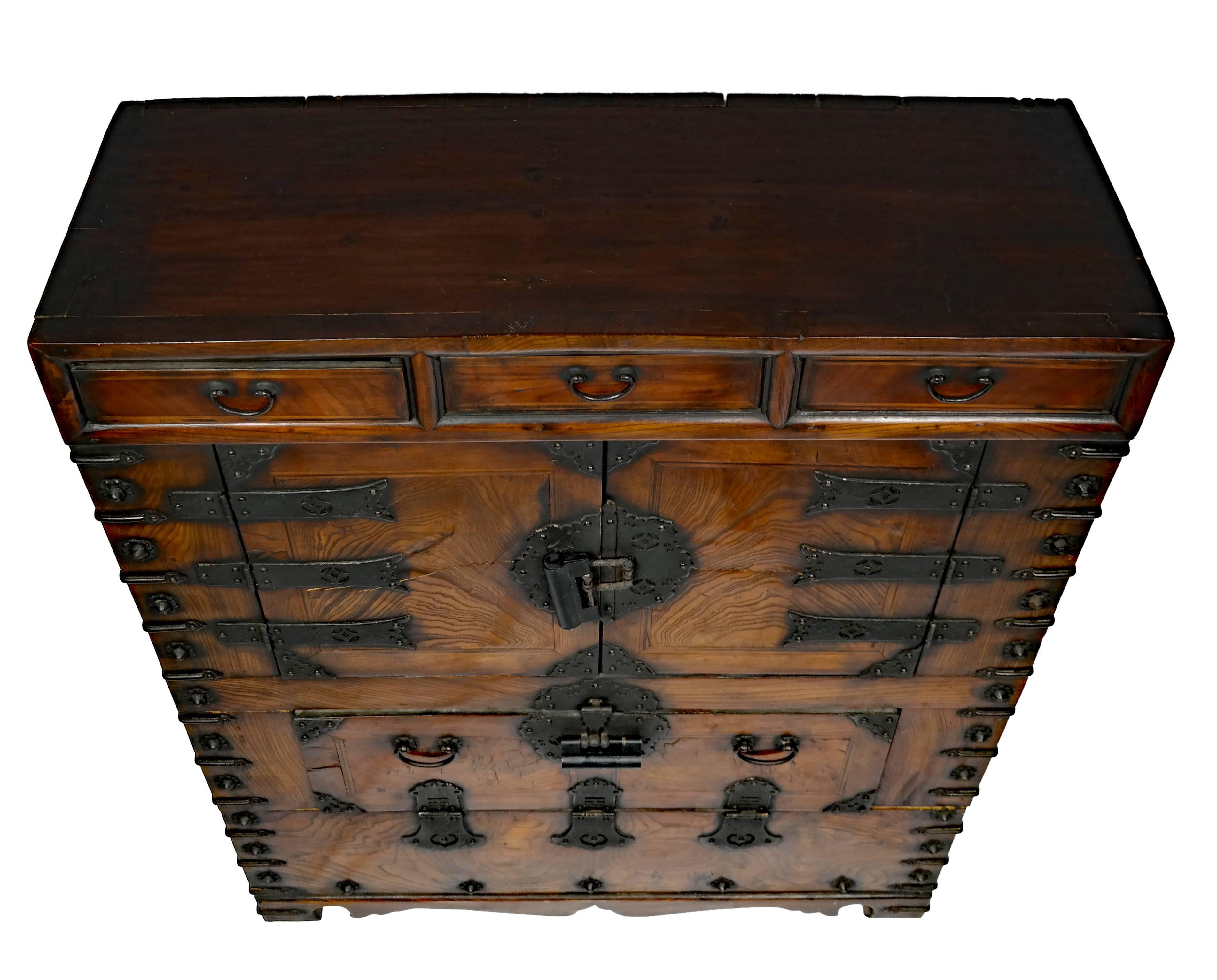 Bandaji book storage chest, Chonju-style, three drawers above double doors and drop door in center, with handle on either side, with Chinese locks, early 20th century, Korean.