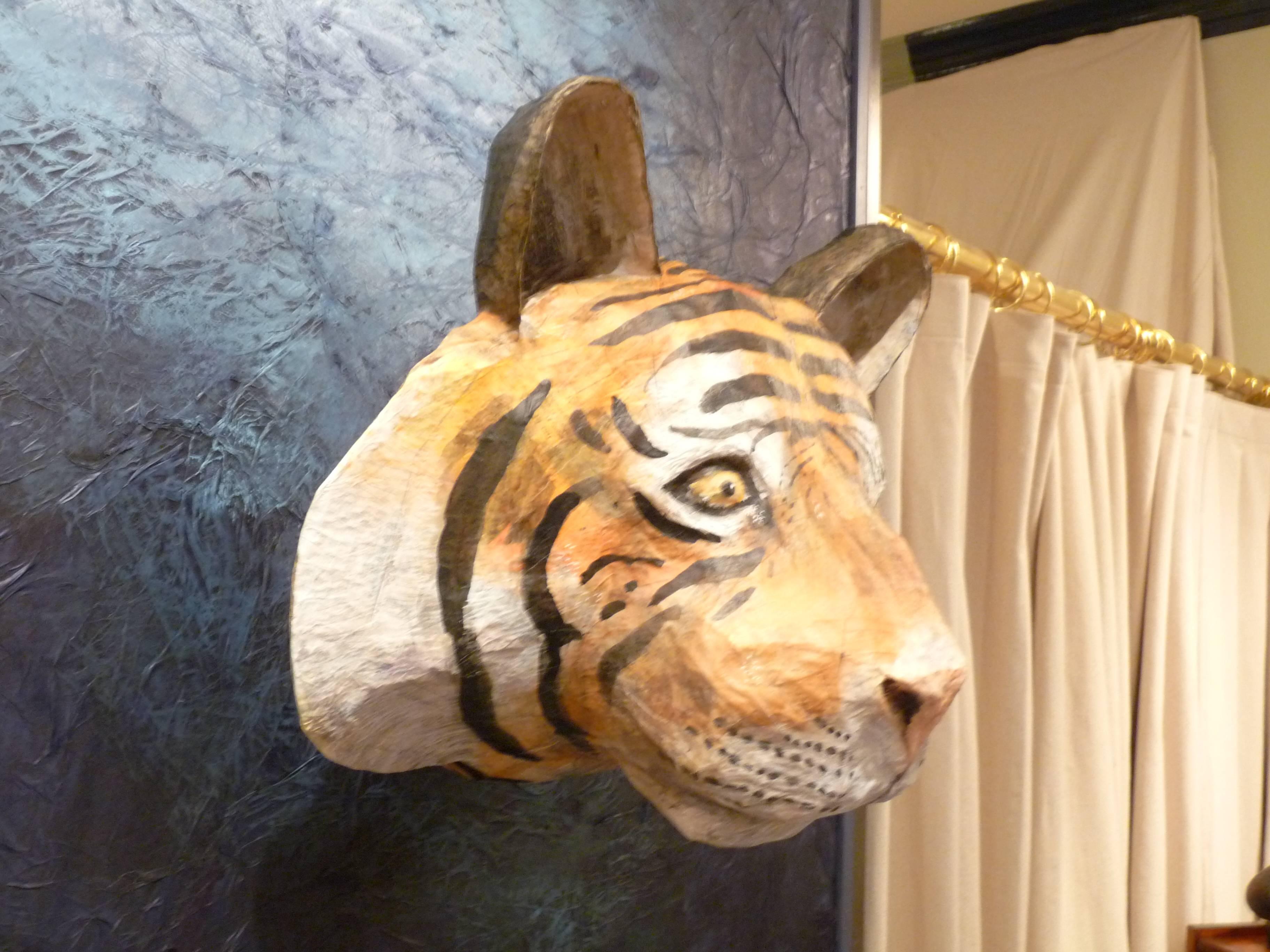We love having this handsome tiger watch over us.  Hand-crafted out of paper mache by British artist Emily Warren, this eco-friendly mount is a whimsical addition to any living space.