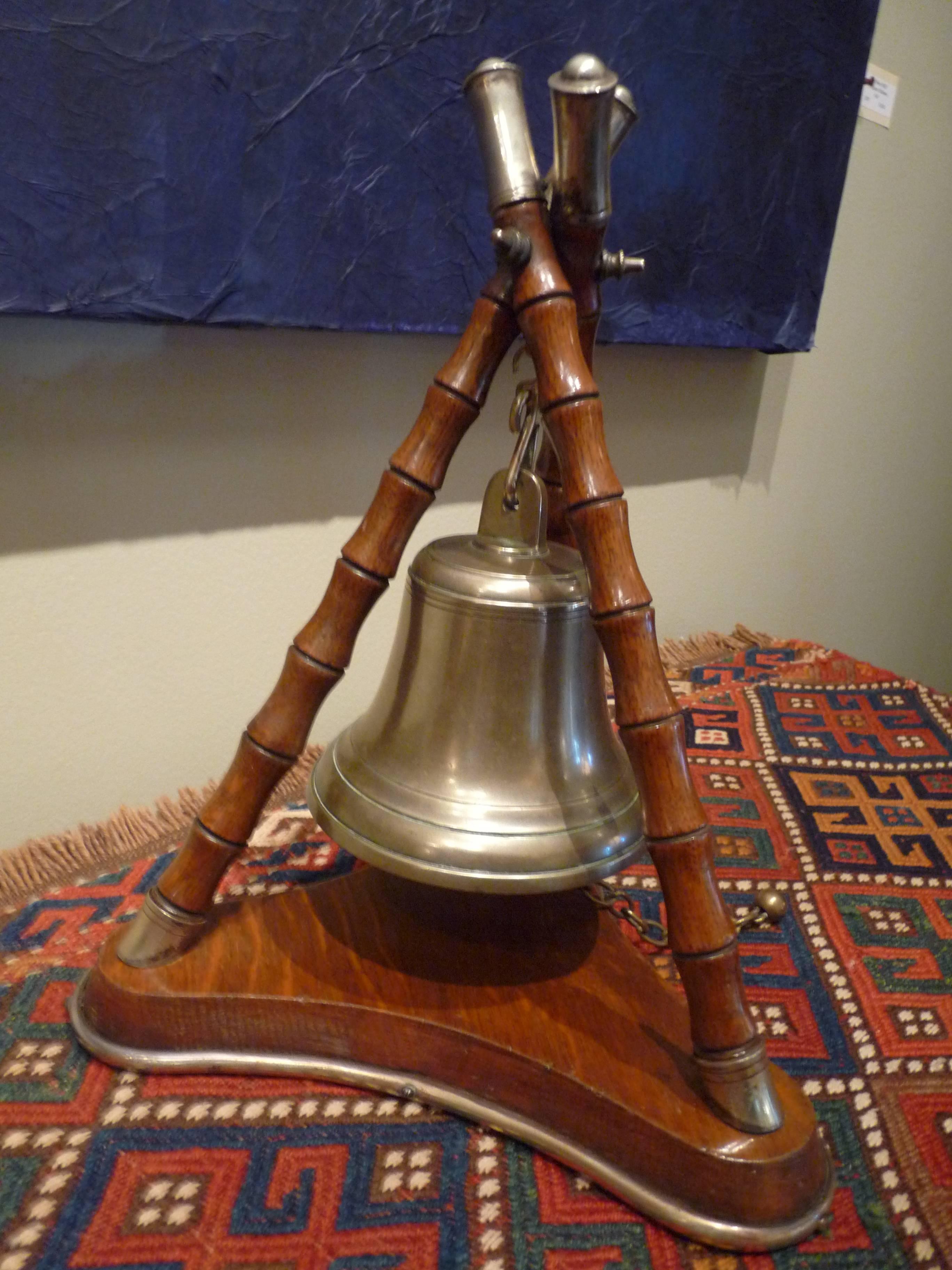 We love the stylish dinner bells and gongs from the Edwardian era, and this is one of the coolest we've had. The frame is a tripod of faux bamboo with a solid base. The sold brass bell has a wonderful, clear tone. Great for announcing dinner or the