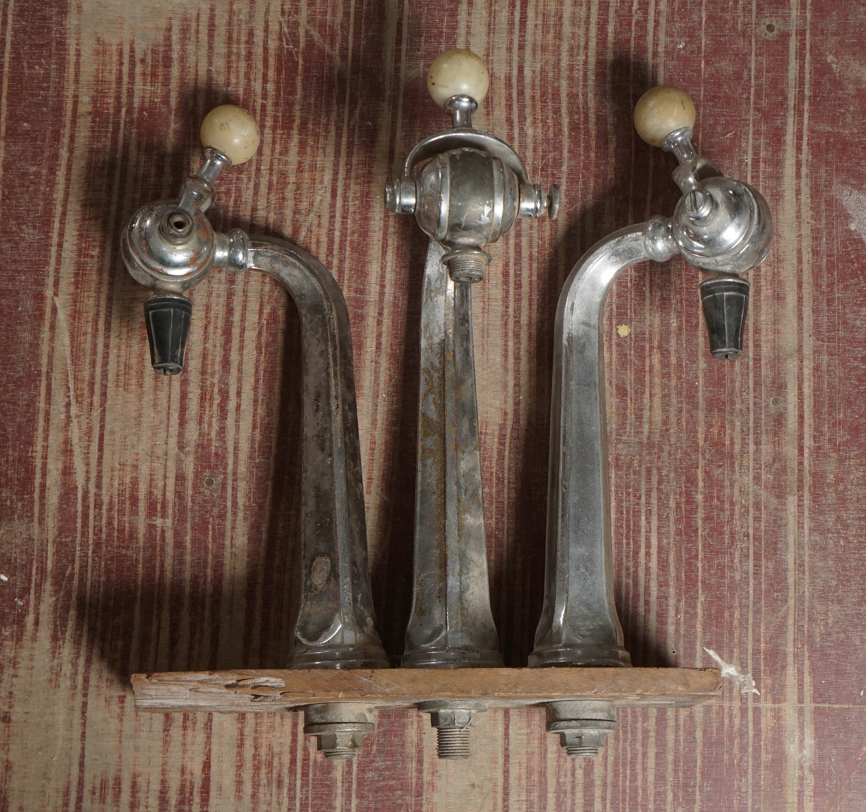 Three matching original spouts for water, seltzer etc. Alabaster handles.